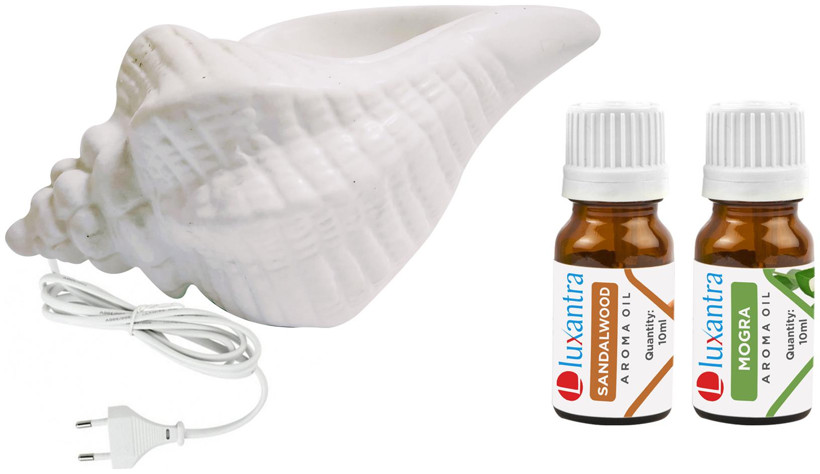 Luxantra White Ceramic Electric Shankh Aroma Diffuser with Sandalwood Mogra Aroma Oil 10ml Each for Home Office hotel 20x11x11cm
Luxantra White Ceramic Electric Shankh Aroma Diffuser with Sandalwood Mogra Aroma Oil 10ml Each for Home Office hotel 20x11x11cm