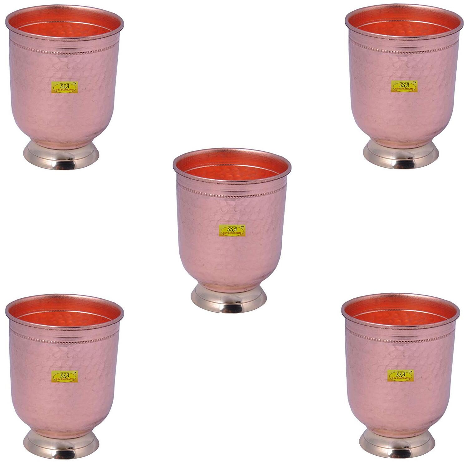 Shiv Shakti Arts Set Of 5 12 cm X 9 cm Handmade Pure Copper Glass Tumbler Hammered Design With Brass Base and Broad Opening Capacity 300 ml
Shiv Shakti Arts Set Of 5 12 cm X 9 cm Handmade Pure Copper Glass Tumbler Hammered Design With Brass Base and Broad Opening Capacity 300 ml
