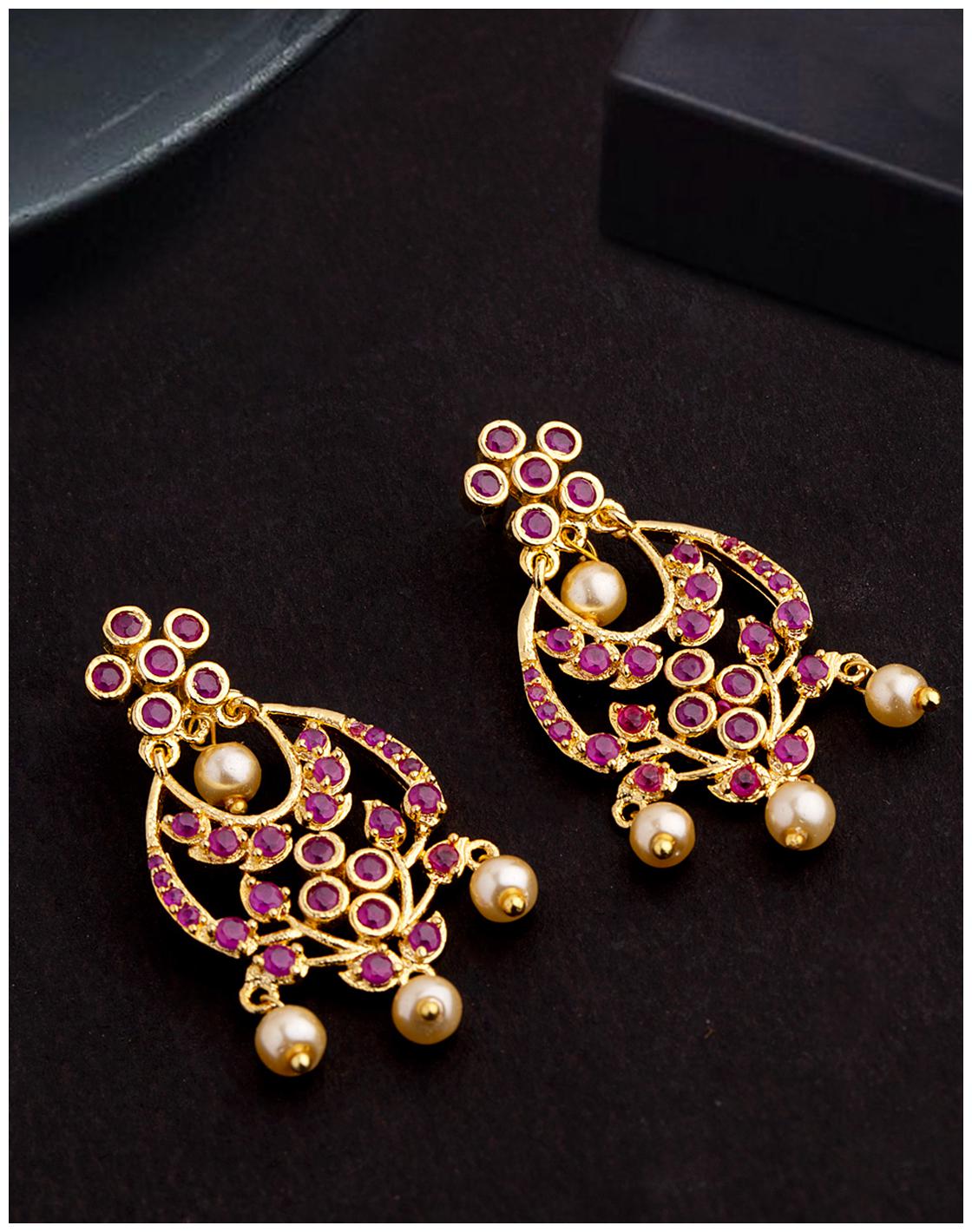 Voylla Red Zircon Gems and Faux Pearls Earrings
Voylla Red Zircon Gems and Faux Pearls Earrings