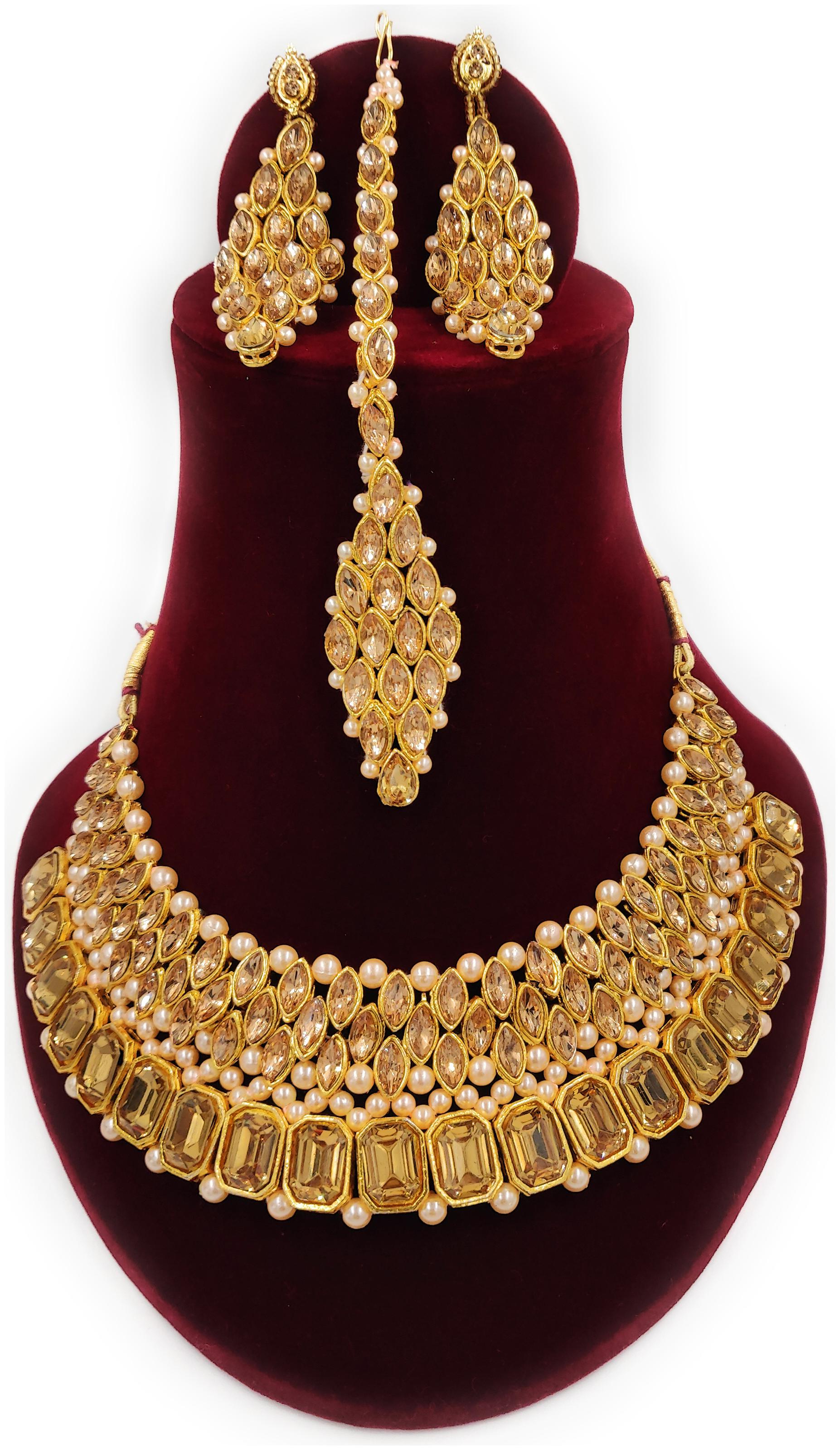 ZaffreCollections Gold Crystal Choker set with earring and Maang tikka for Women
ZaffreCollections Gold Crystal Choker set with earring and Maang tikka for Women