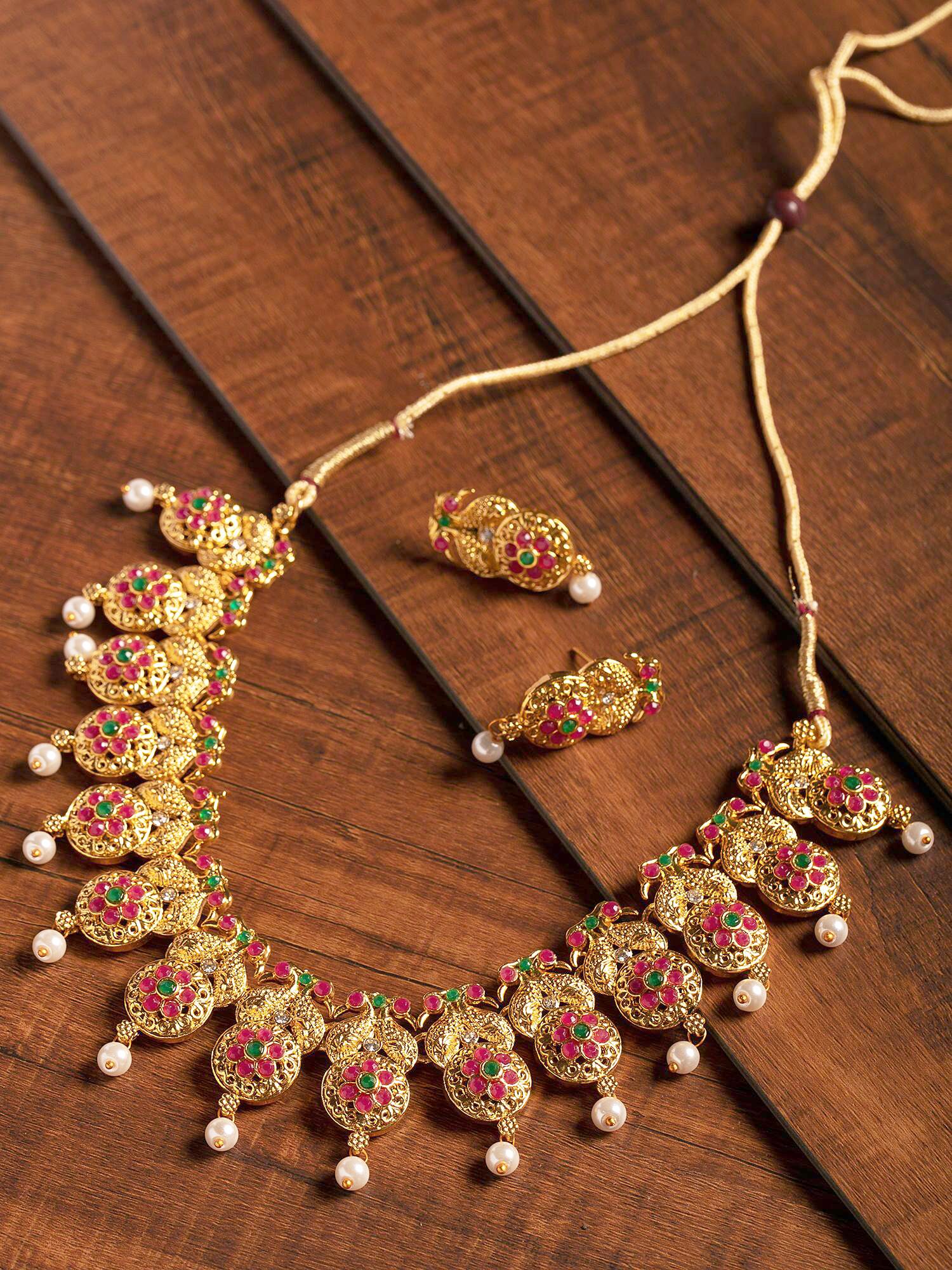 Zaveri Pearls Red Green Stones Peacock Inspired Floral Necklace Earring Set-ZPFK9385
Zaveri Pearls Red Green Stones Peacock Inspired Floral Necklace Earring Set-ZPFK9385