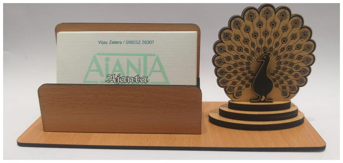 A-Mart Wooden Finish Visiting Card Holder With Dancing Peacock Design For Office Table
A-Mart Wooden Finish Visiting Card Holder With Dancing Peacock Design For Office Table