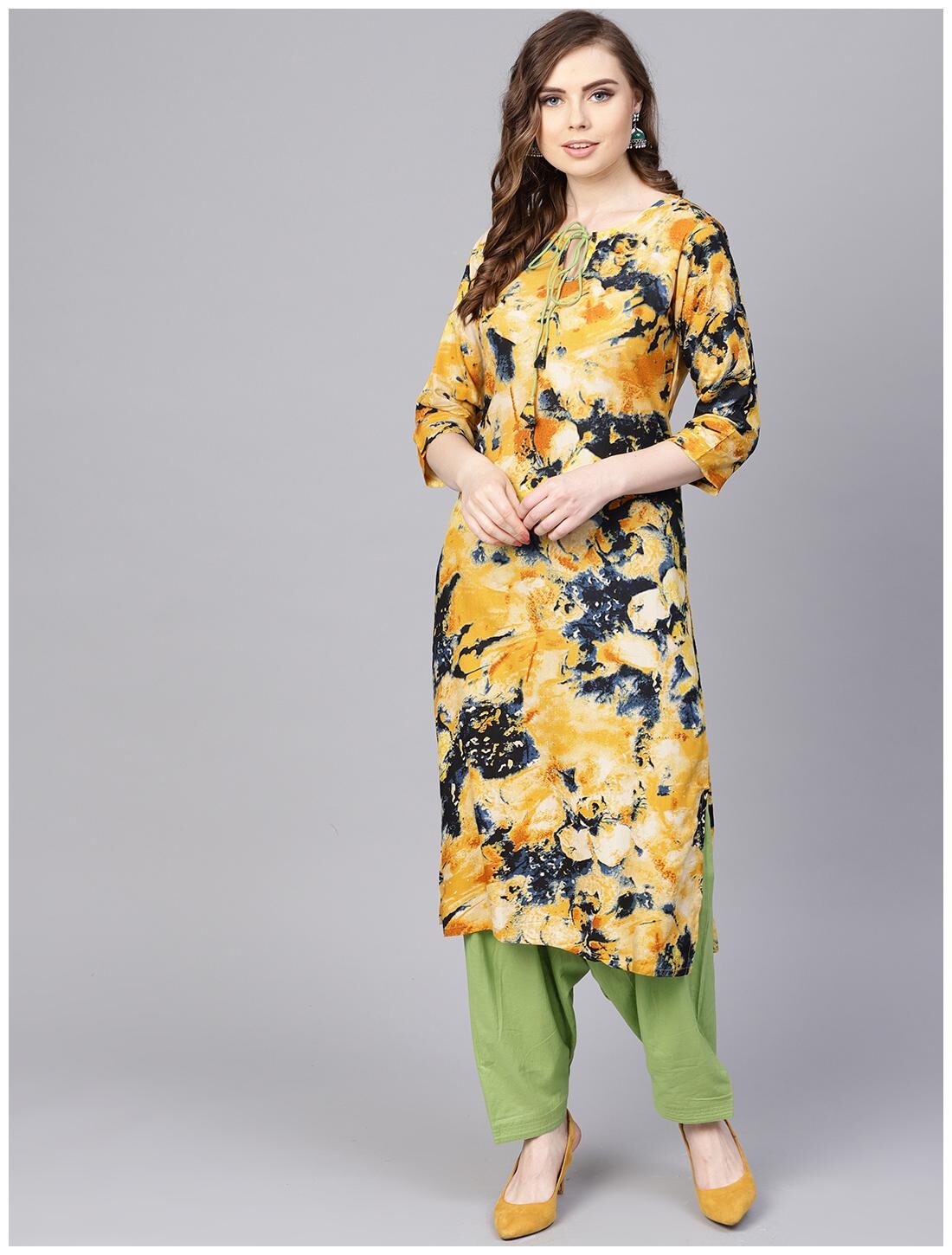 

AASI- HOUSE OF NAYO Women Yellow Printed Straight Kurta With Salwar