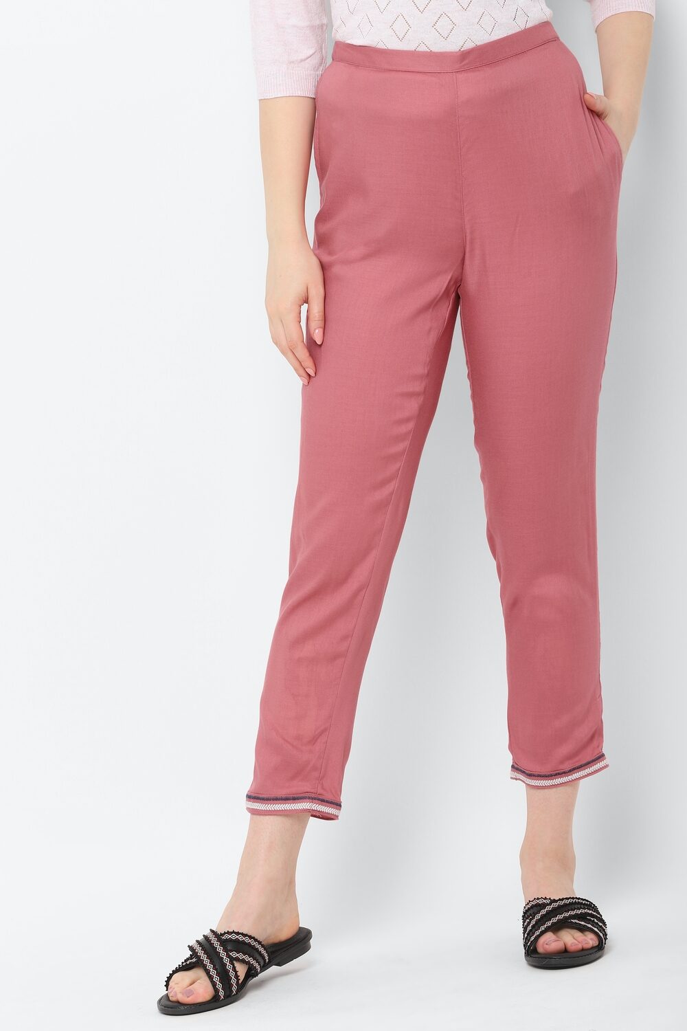 

Allen Solly Women Solid Pink Trousers