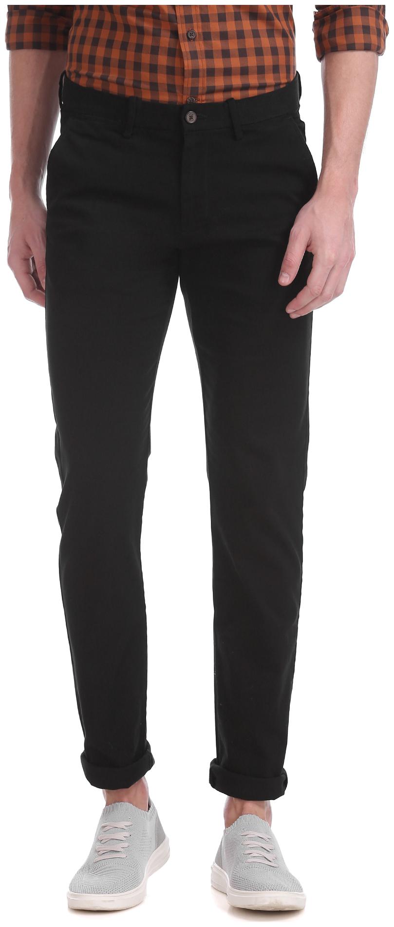 

Arrow Men Black Solid Slim fit Regular trousers