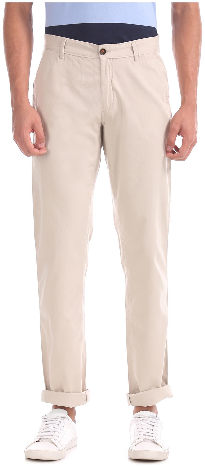 

Arrow Men Beige Solid Slim fit Regular trousers