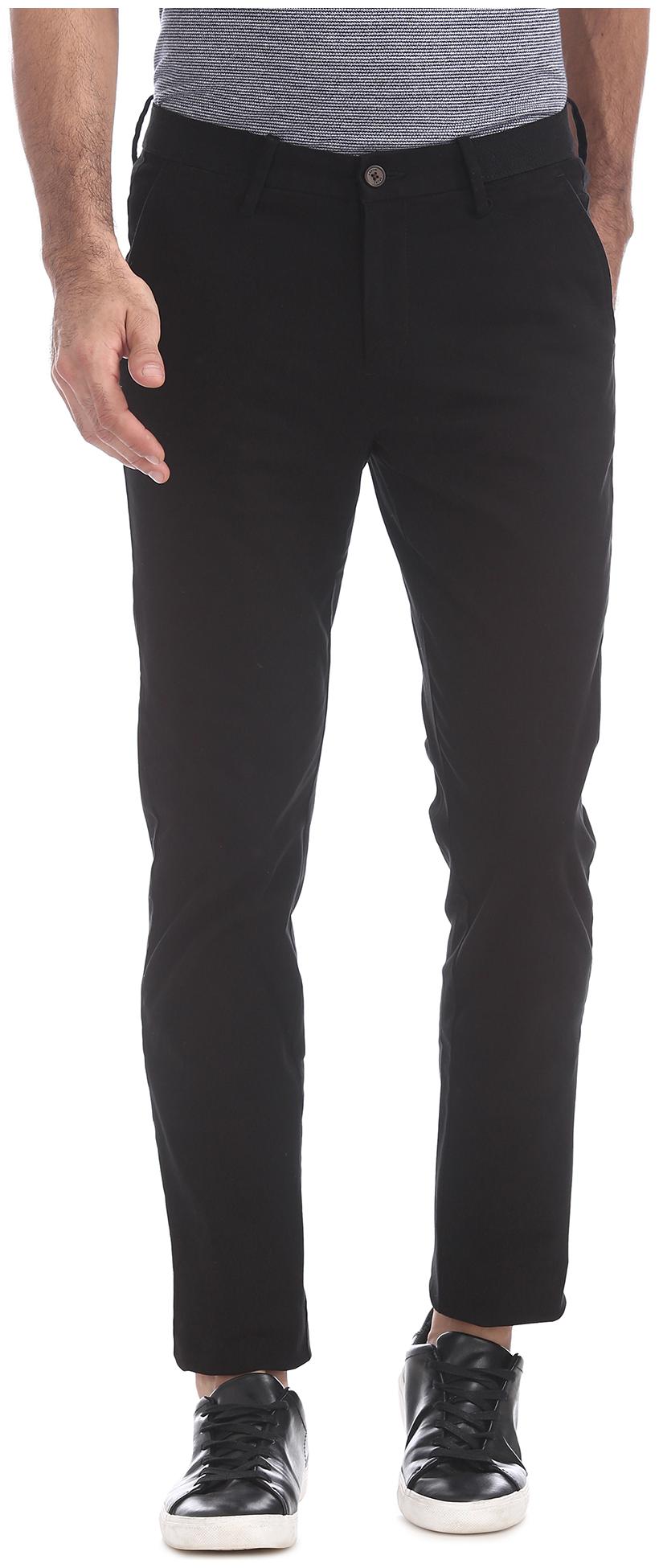 

Arrow Men Black Solid Slim fit Regular trousers