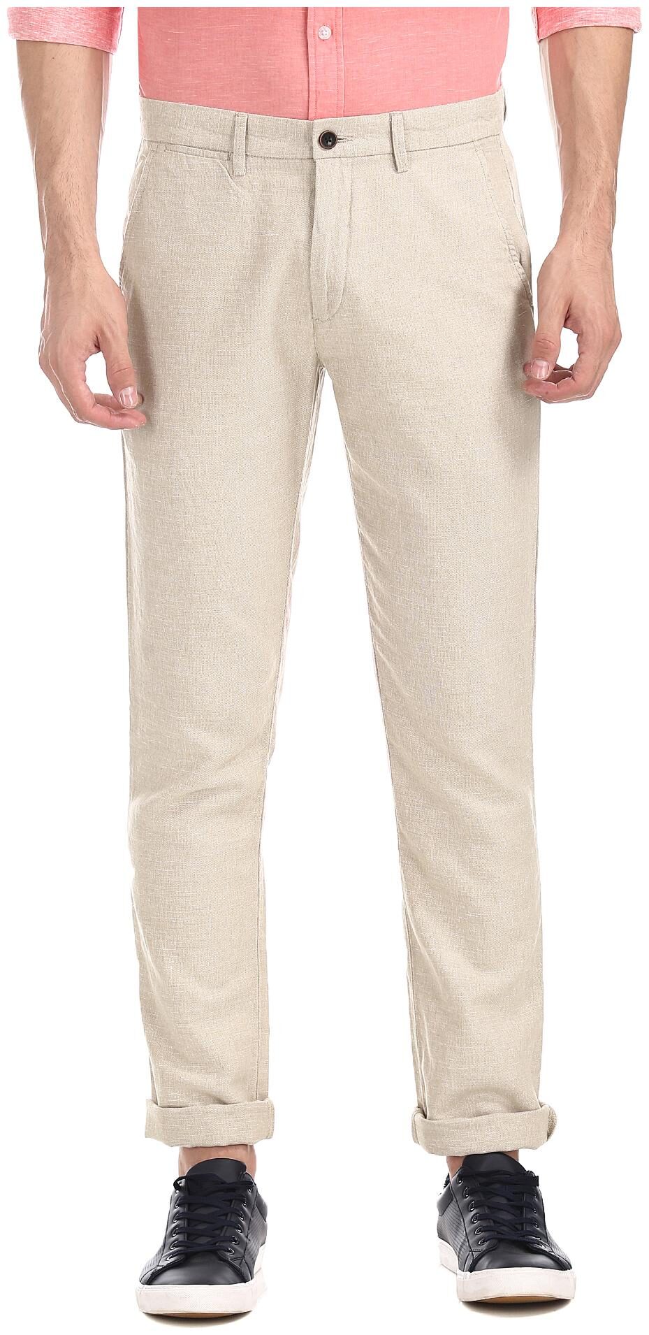 

Arrow Men Beige Solid Slim fit Regular trousers