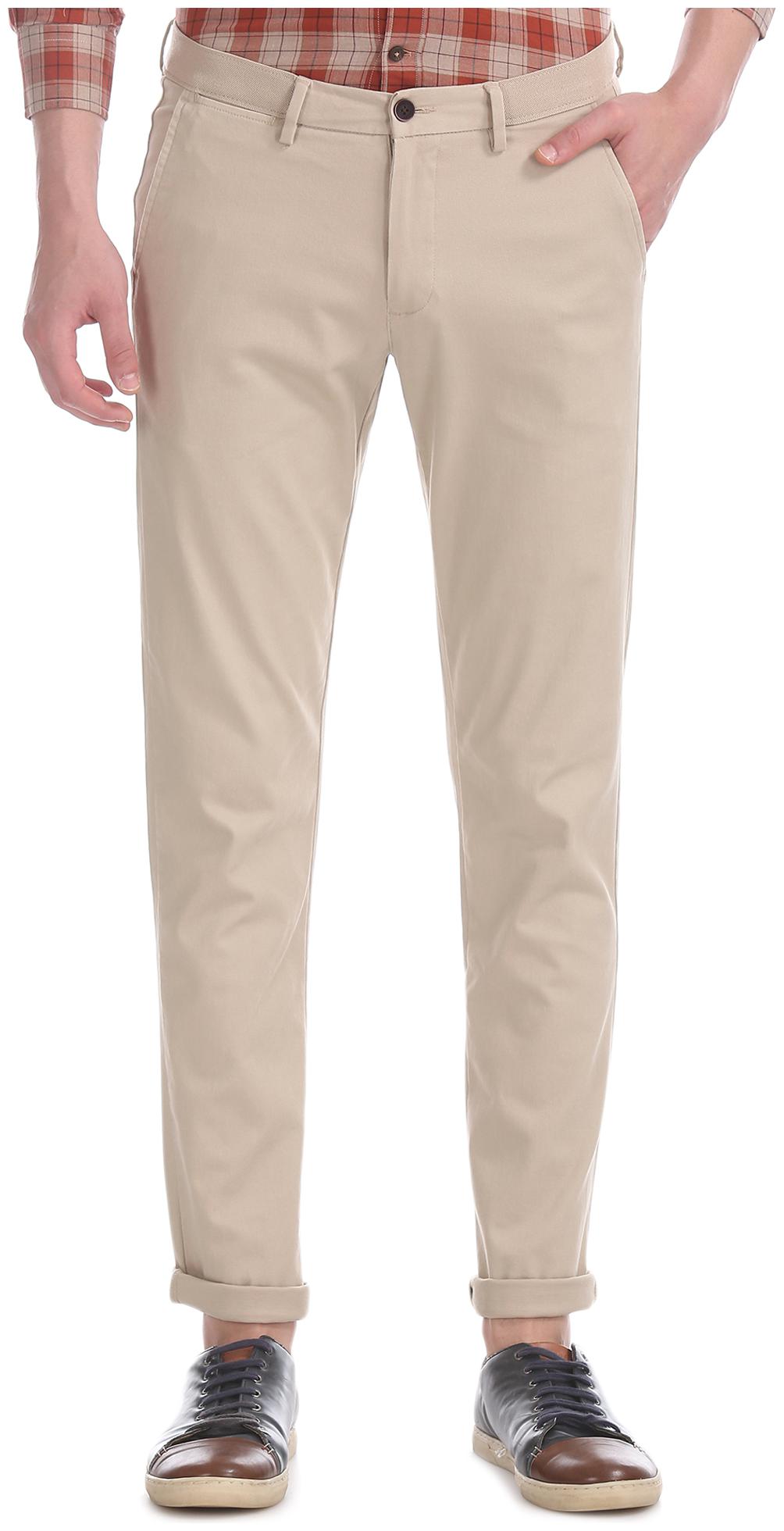 

Arrow Men Beige Solid Slim fit Regular trousers