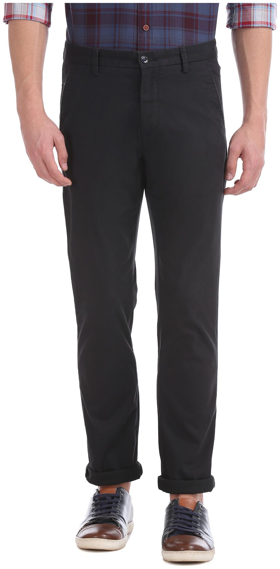 

Arrow Men Black Solid Slim fit Regular trousers