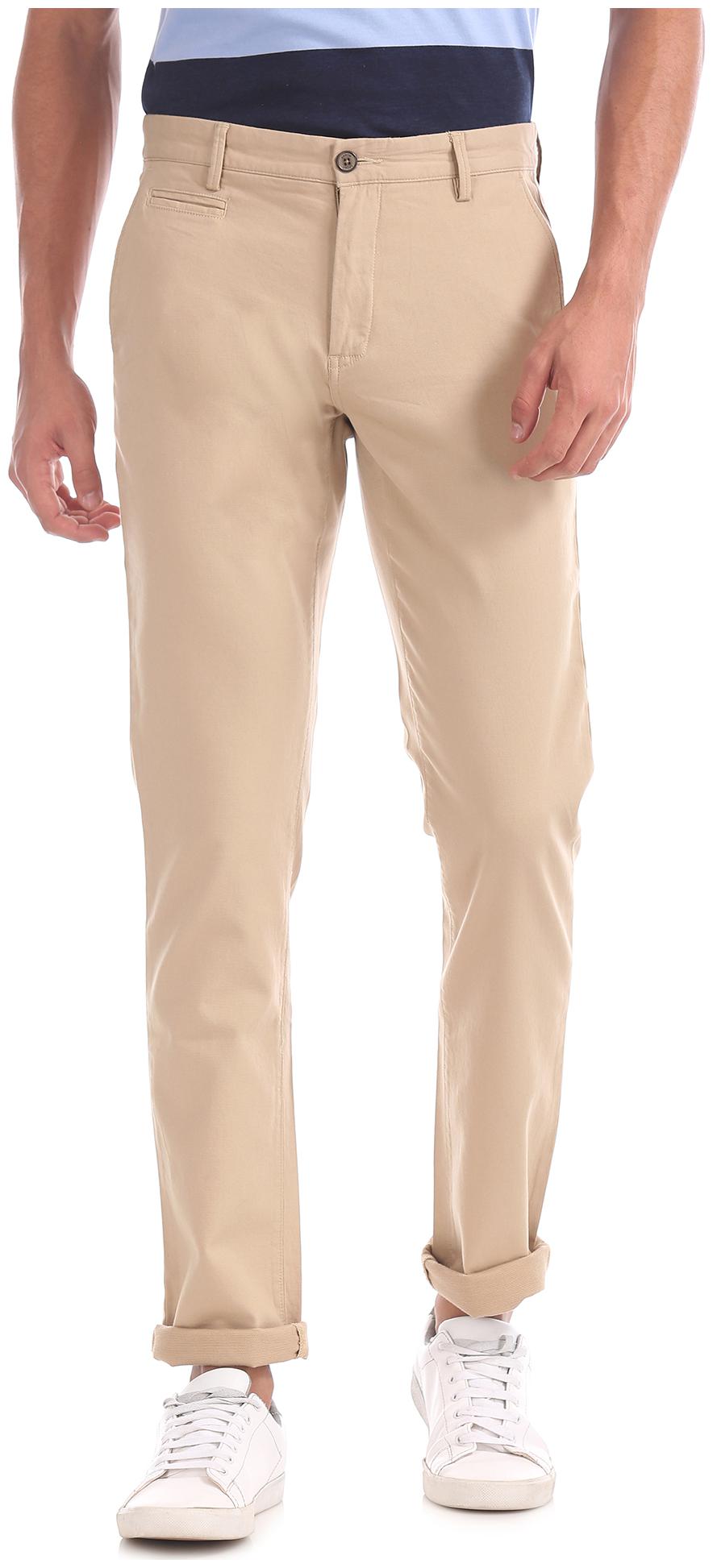 

Arrow Men Beige Solid Slim fit Chinos