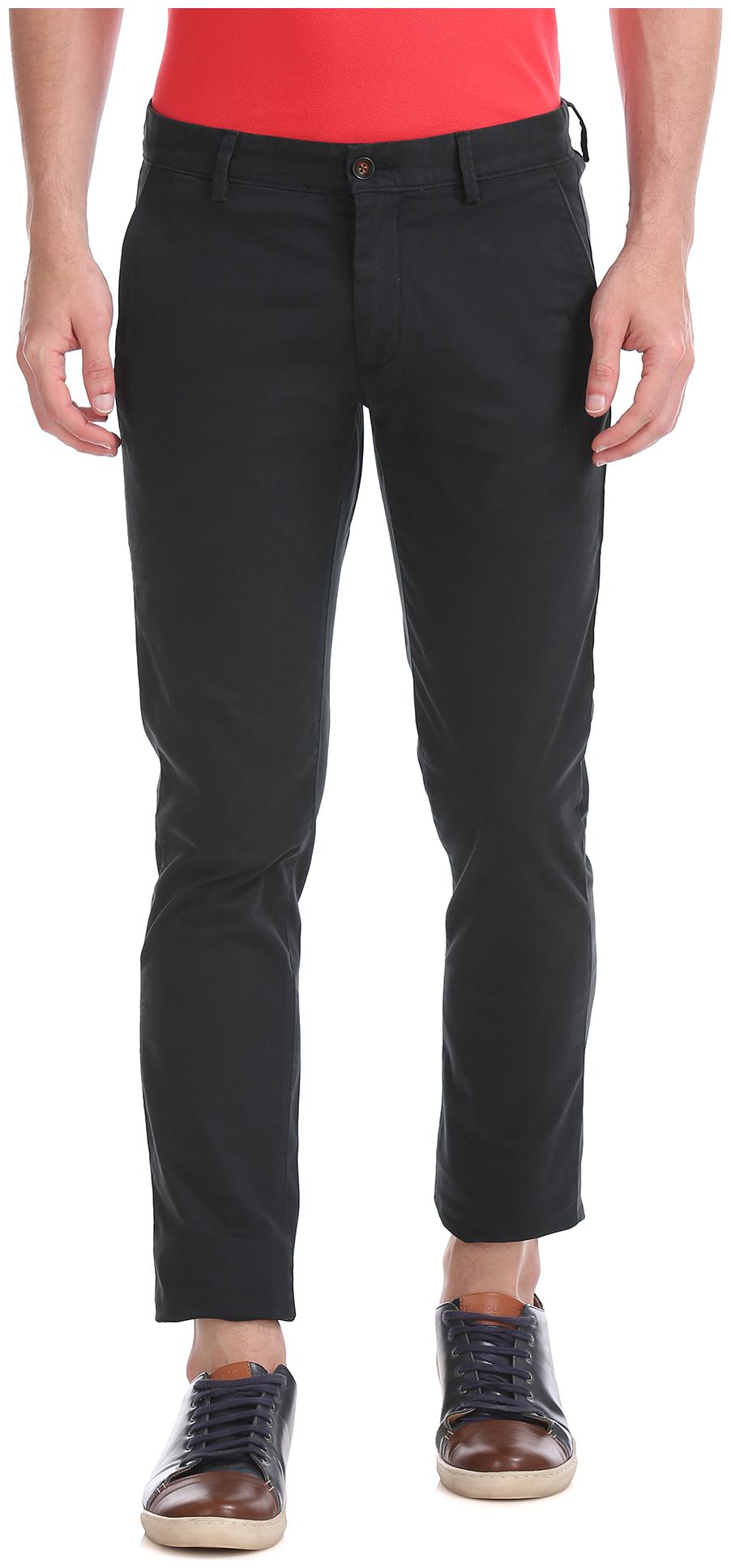 

Arrow Men Black Solid Slim fit Regular trousers