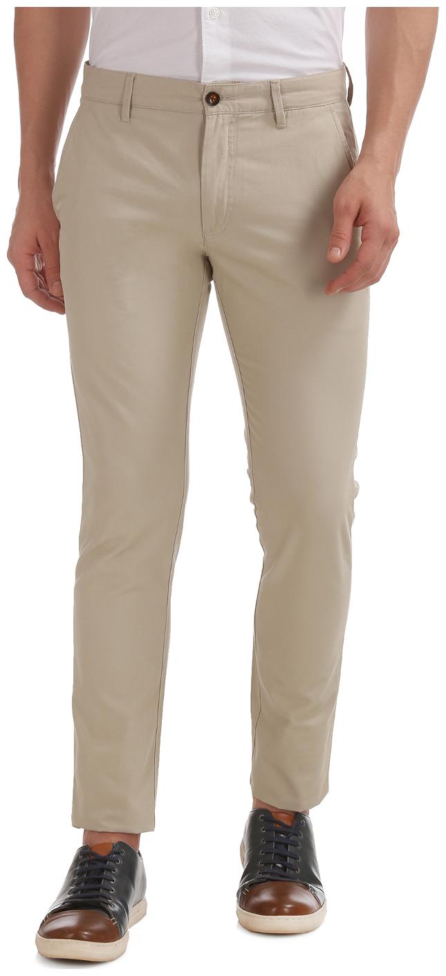 

Arrow Men Beige Solid Slim fit Regular trousers