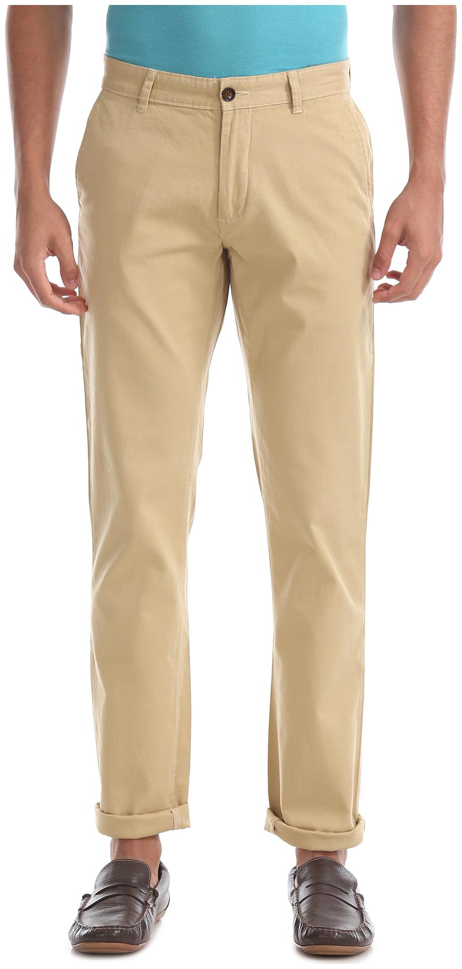 

Arrow Men Beige Solid Slim fit Chinos