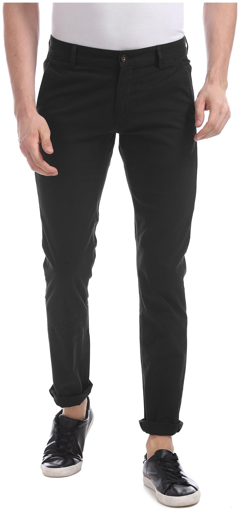 

Arrow Men Black Solid Slim fit Regular trousers