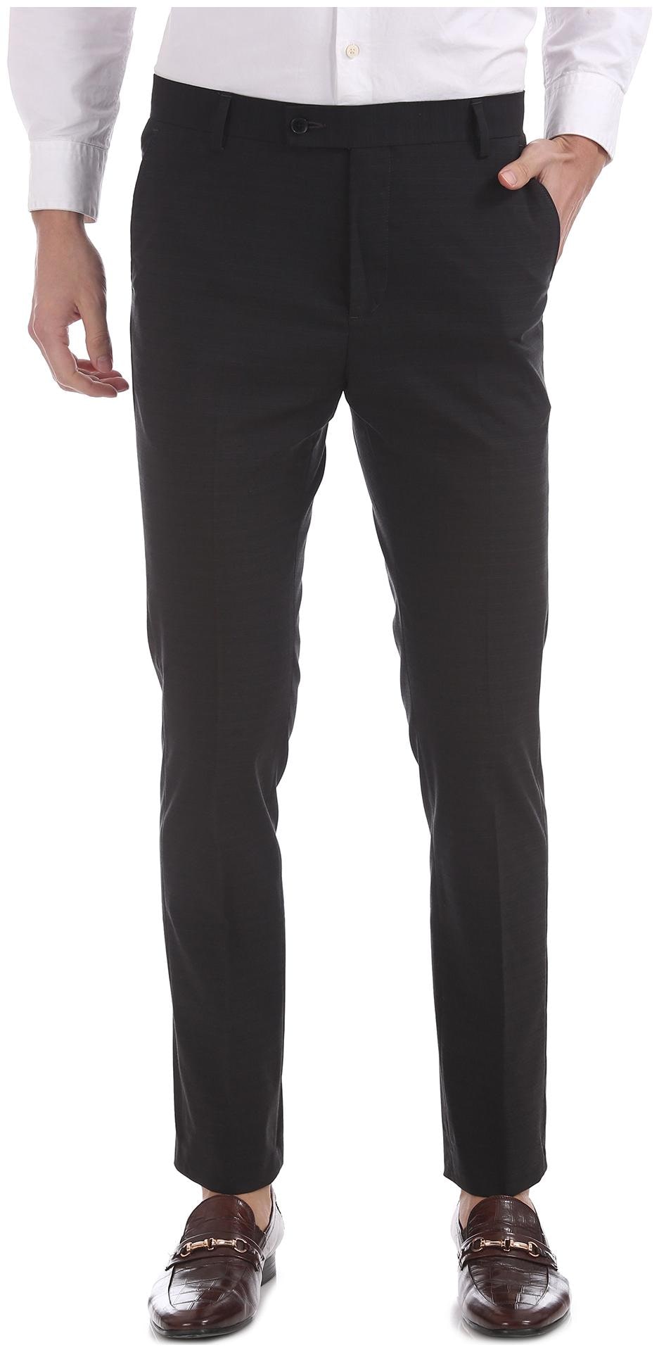 

Arrow Men Black Solid Tapered fit Regular trousers