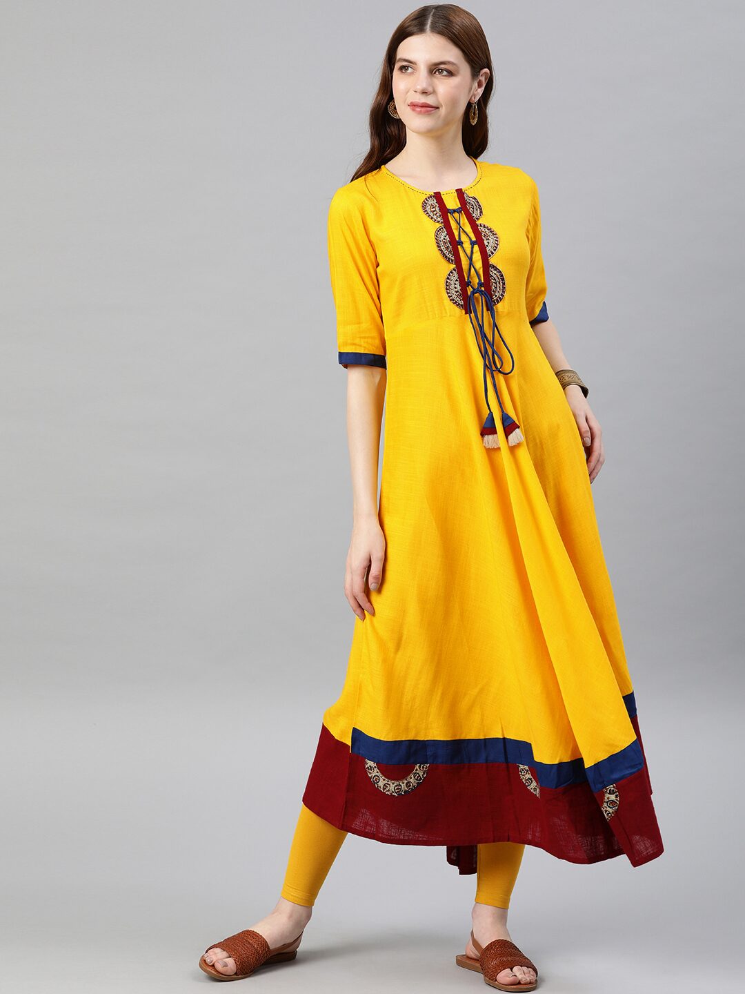 

Yash Gallery Women Yellow Solid Anarkali Kurta