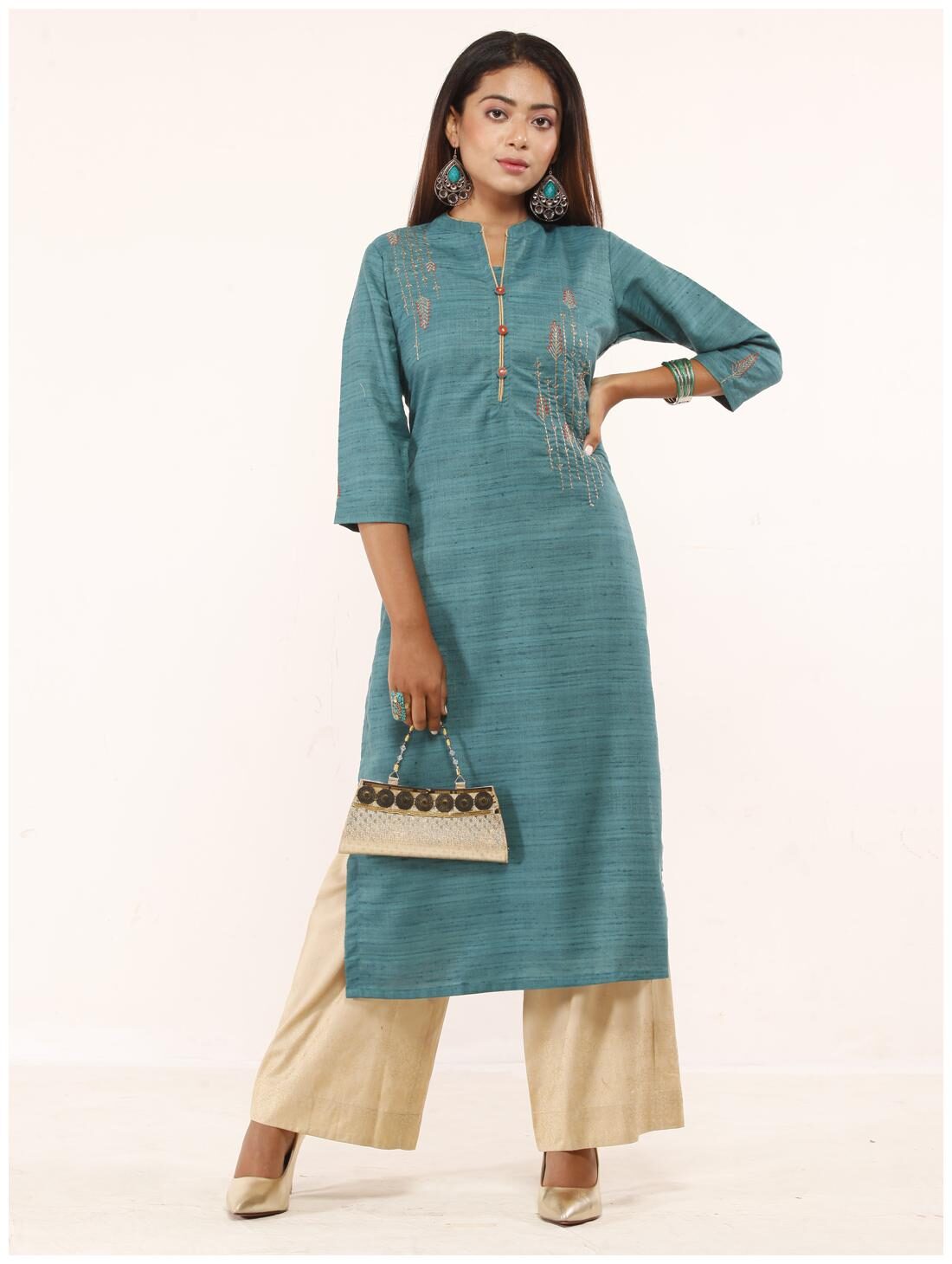 

Celebration Women Turquoise Embroidered Regular Kurti