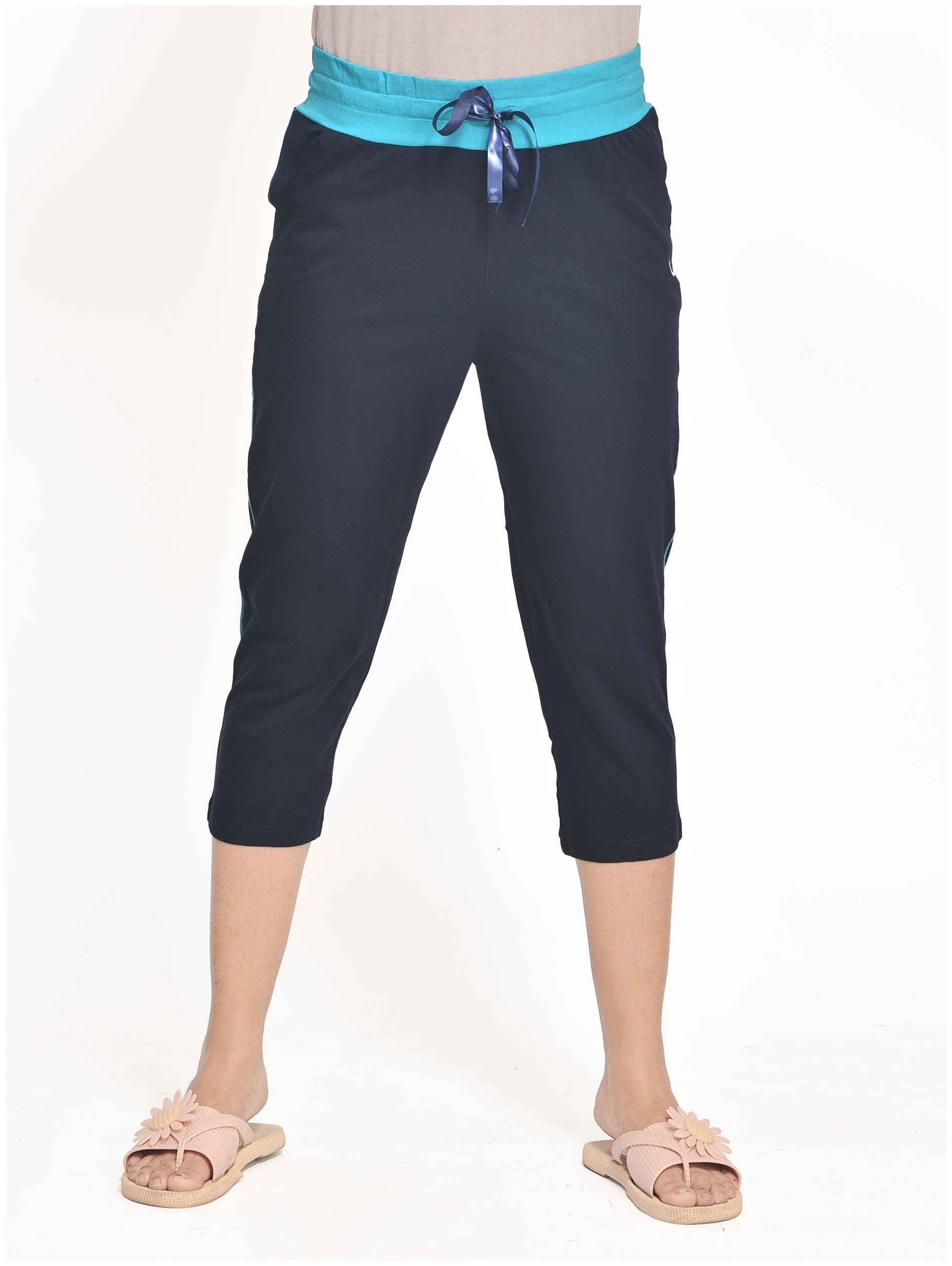 

Club A9 Women Navy Blue Cotton Solid Regular Capri