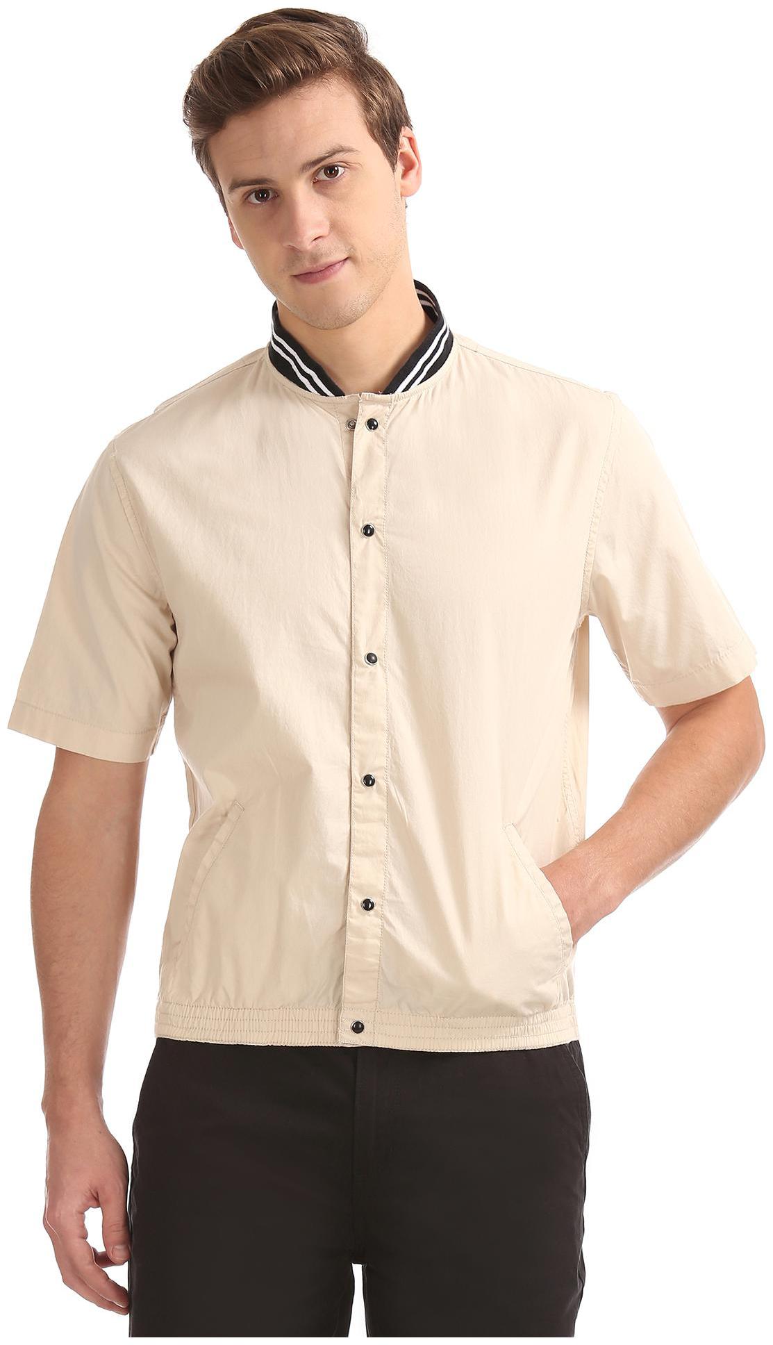 

Colt Men Beige Solid Regular Fit Casual Shirt