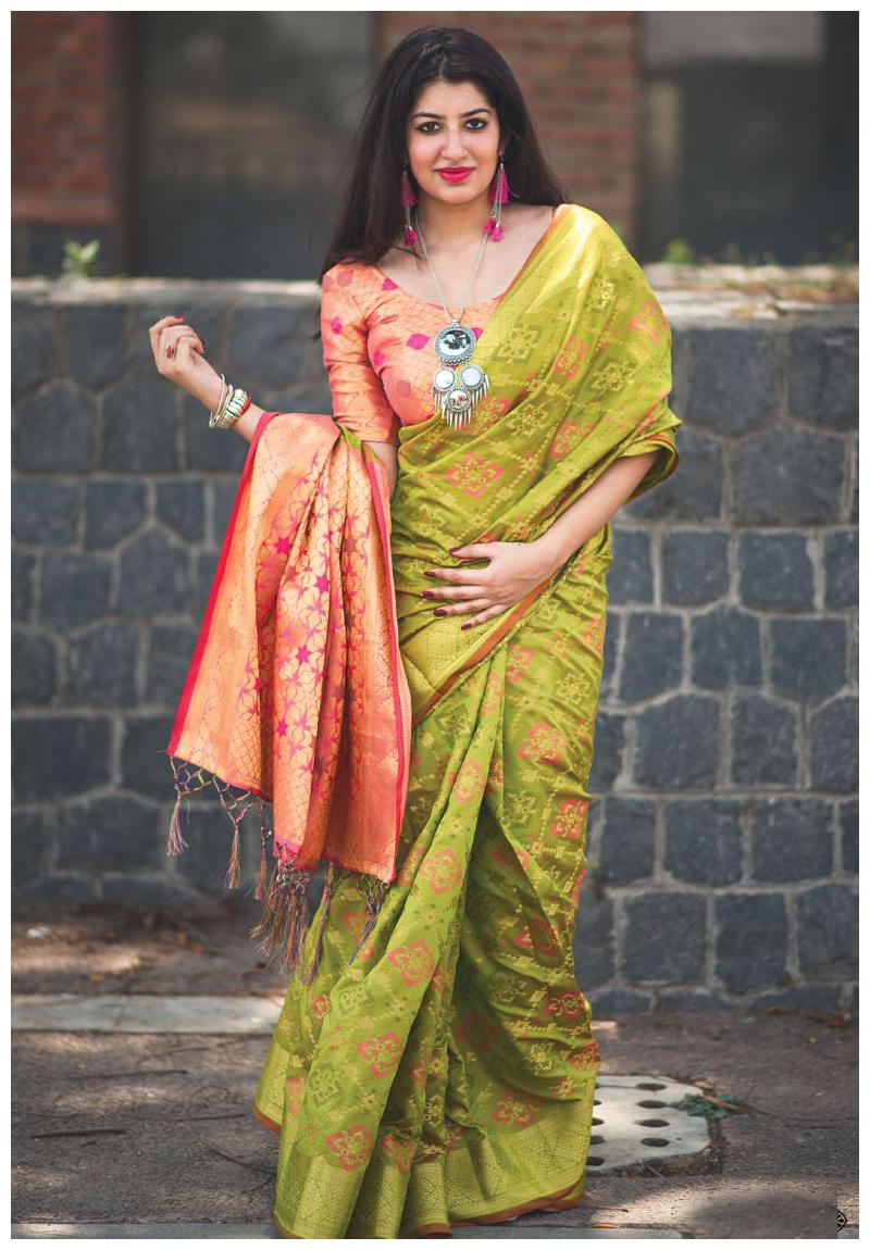 

DesiButik s Party Wear Lovely Green Patola Silk Saree