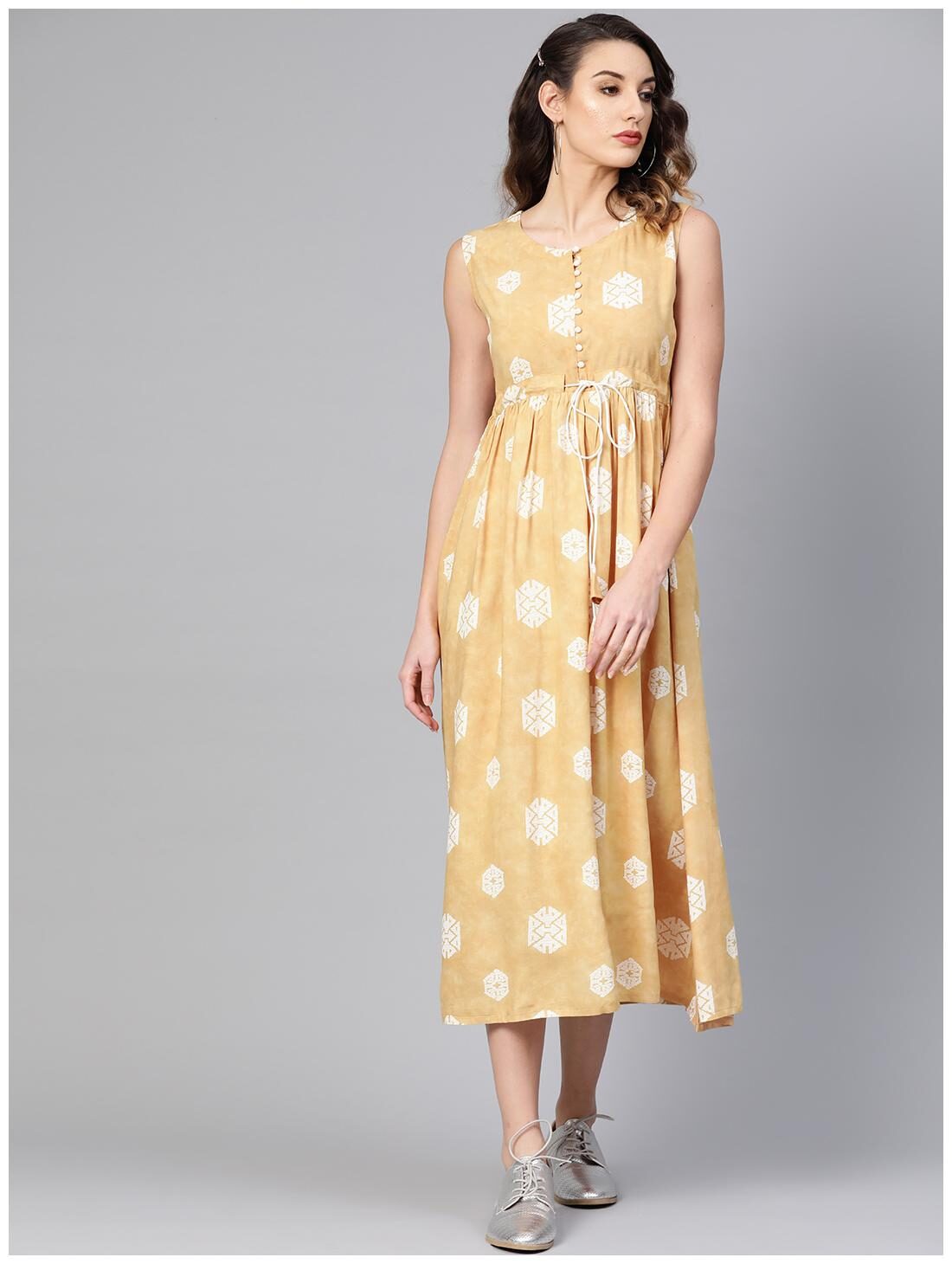 

GERUA Rayon Sleeveless Printed Yellow Kurti Dress