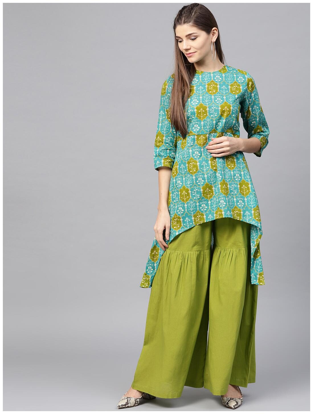 

Green printed 3 4th sleeve cotton High low kurta with green sharara