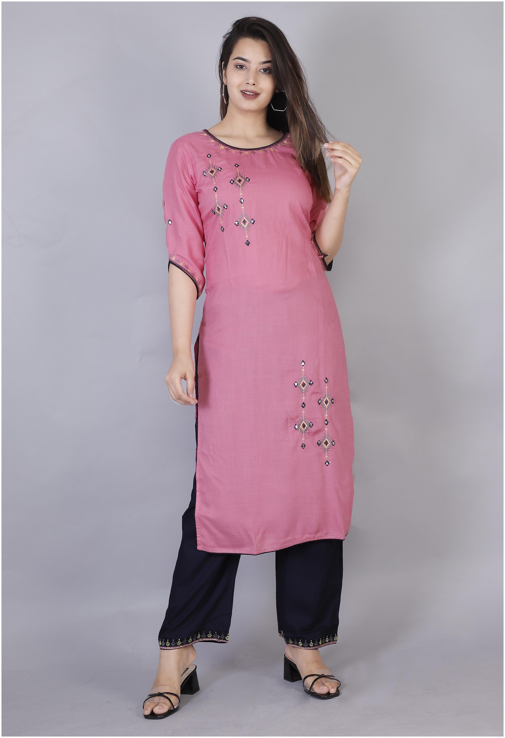

Highlight Fashion Export Women Pink Viscose Rayon Embroidered Kurta and Pant