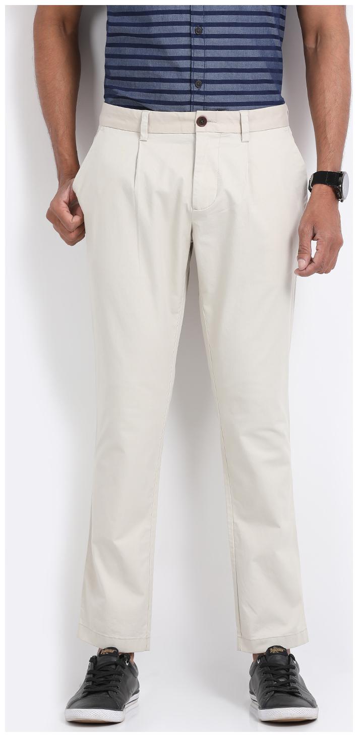 

Indian Terrain Men White Solid Tapered fit Regular trousers