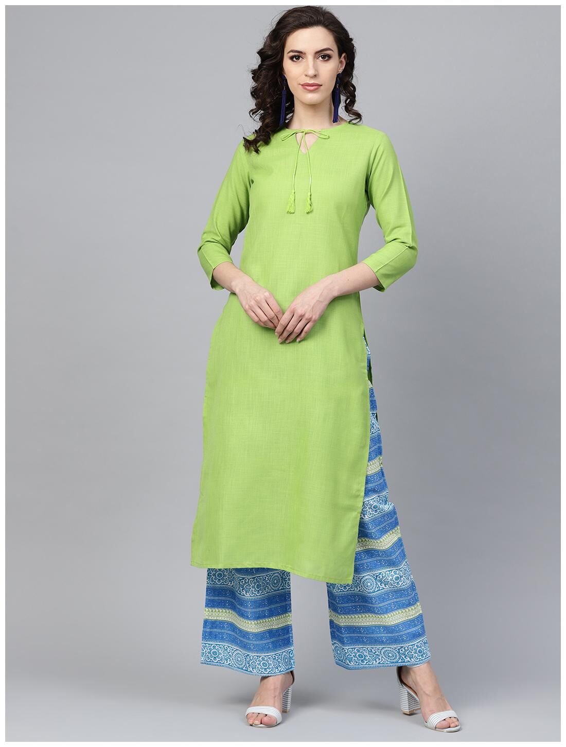 

INDO ERA Women Green Solid Straight Kurta