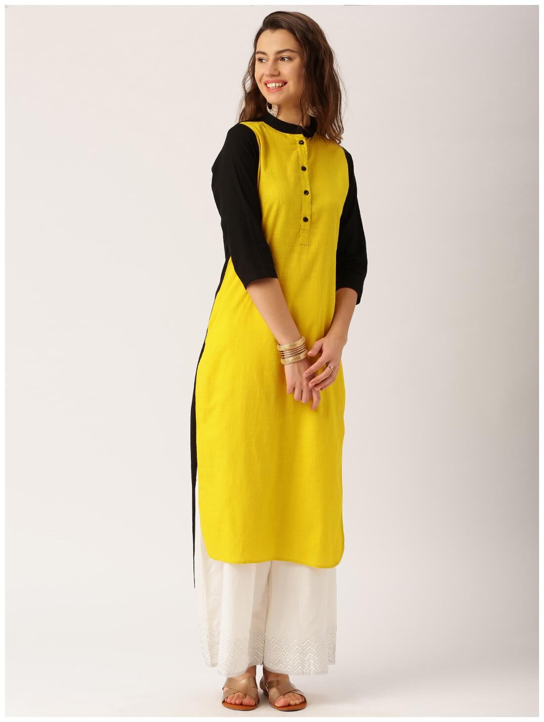 

Jaipur Kurti Women Yellow Solid Straight Kurta