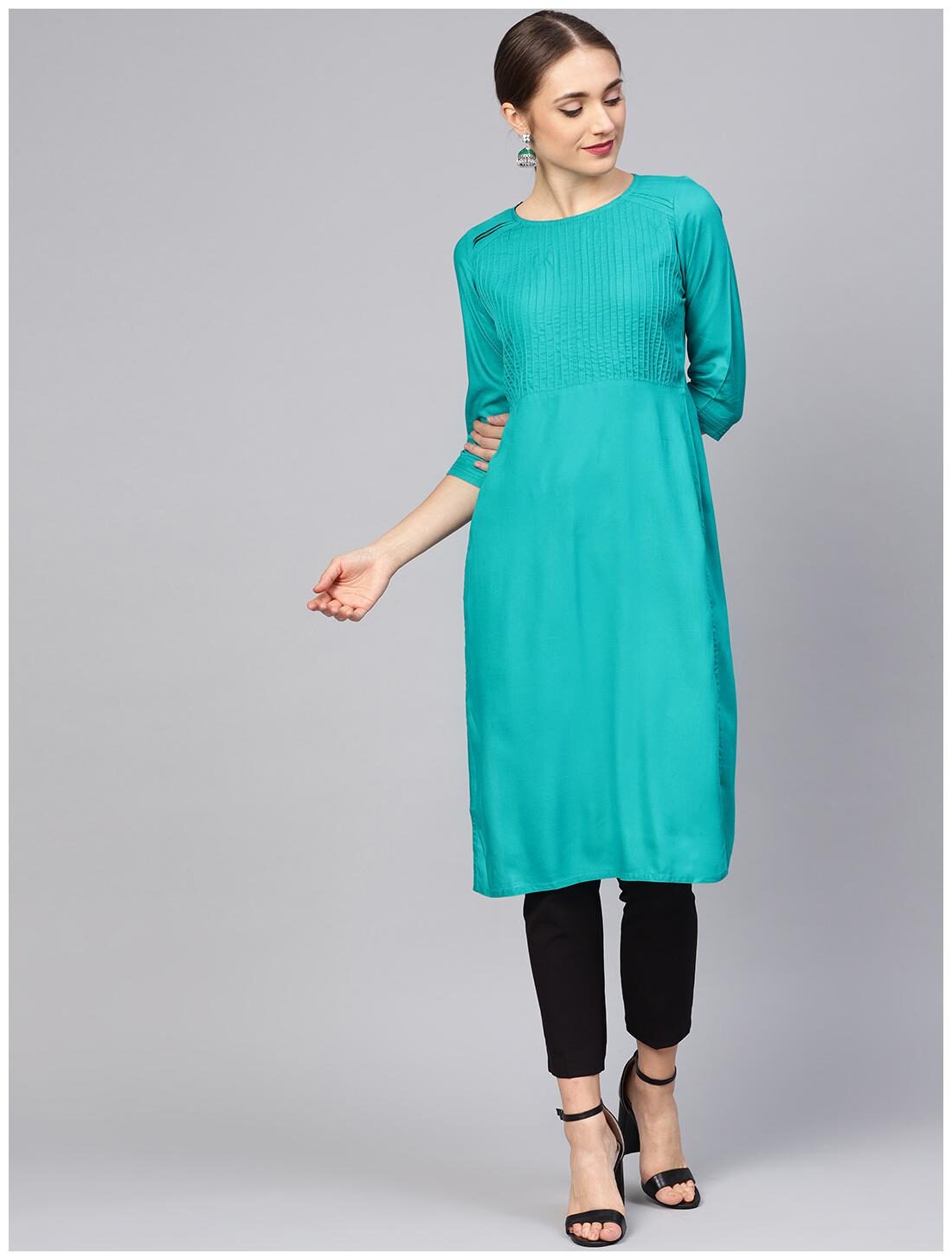 

Jaipur Kurti Women Turquoise Solid Straight Kurti