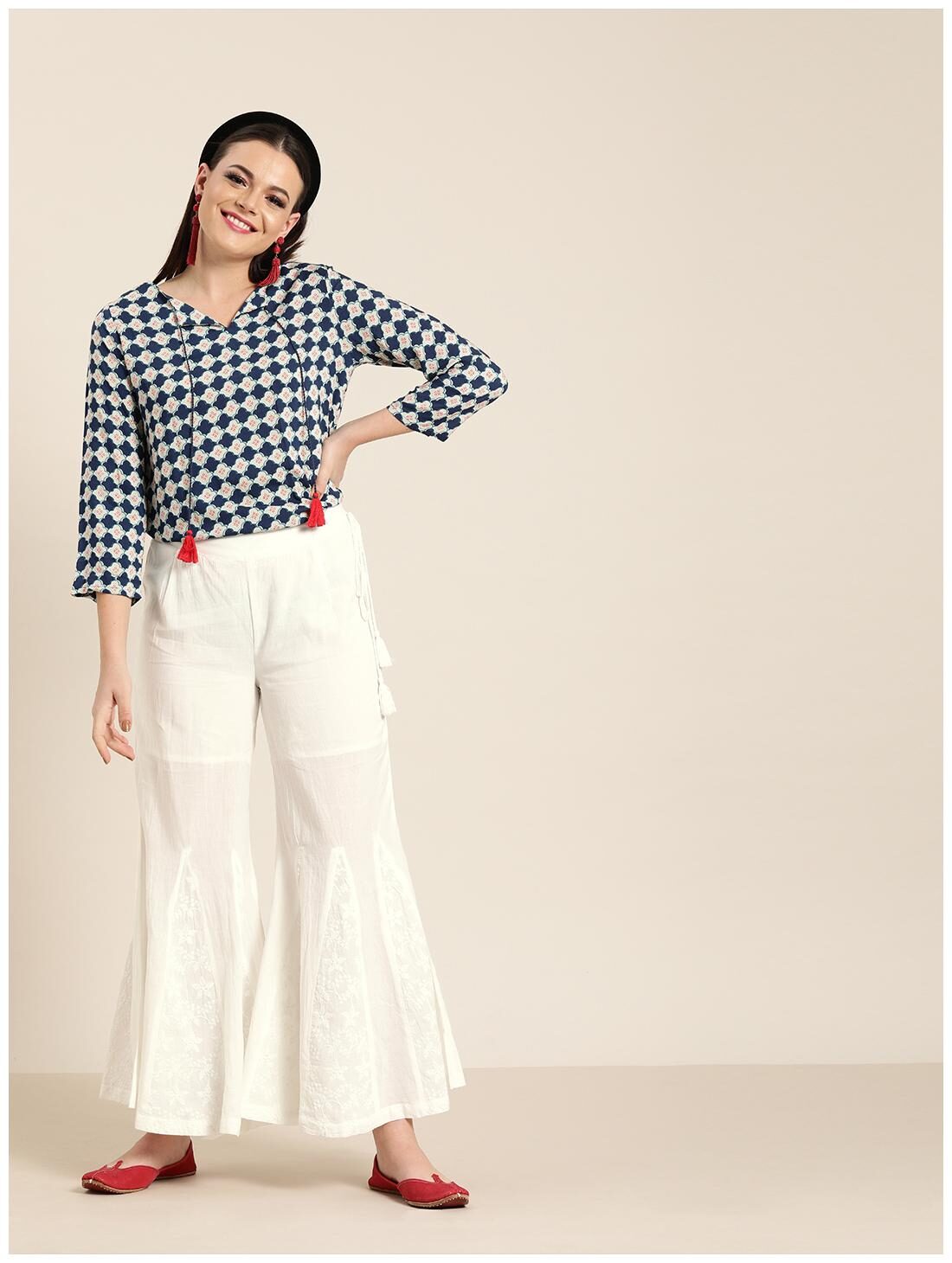 

Jaipur Kurti White Solid Flared Palazzo