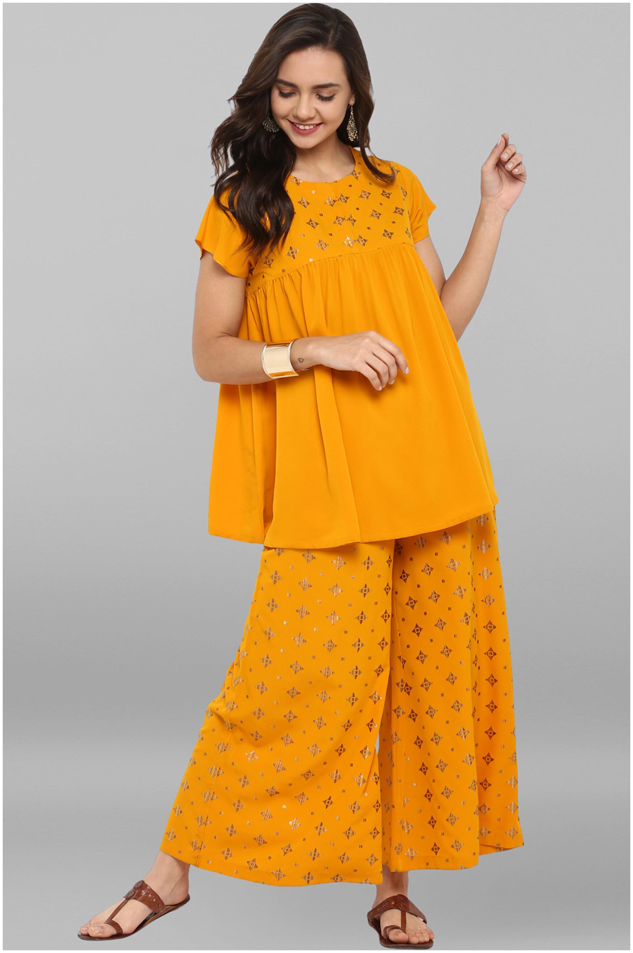 

Janasya Crepe Medium Partywear Kurta With Palazzo Mustard color