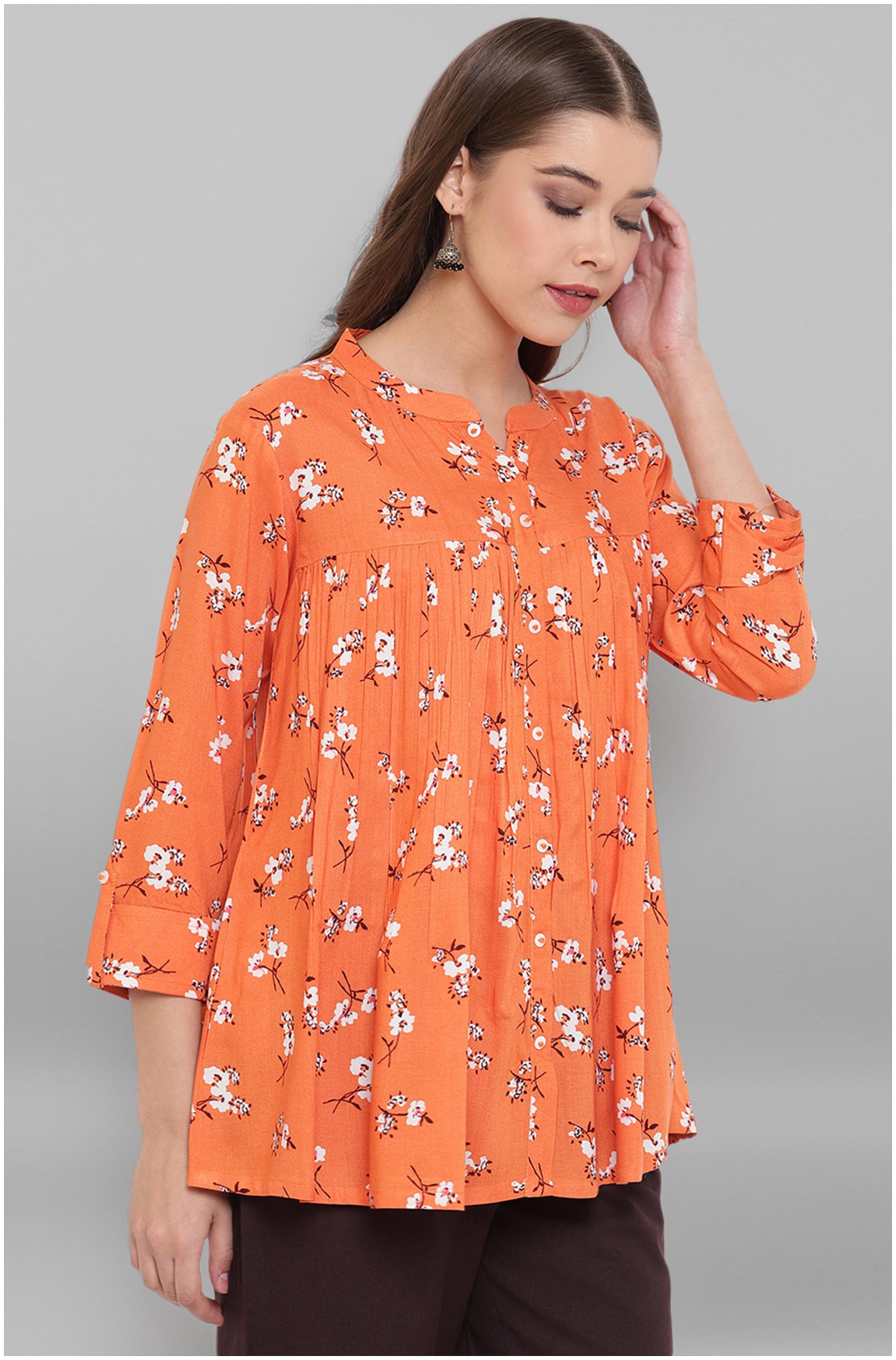 

Janasya Women Floral Regular top - Orange