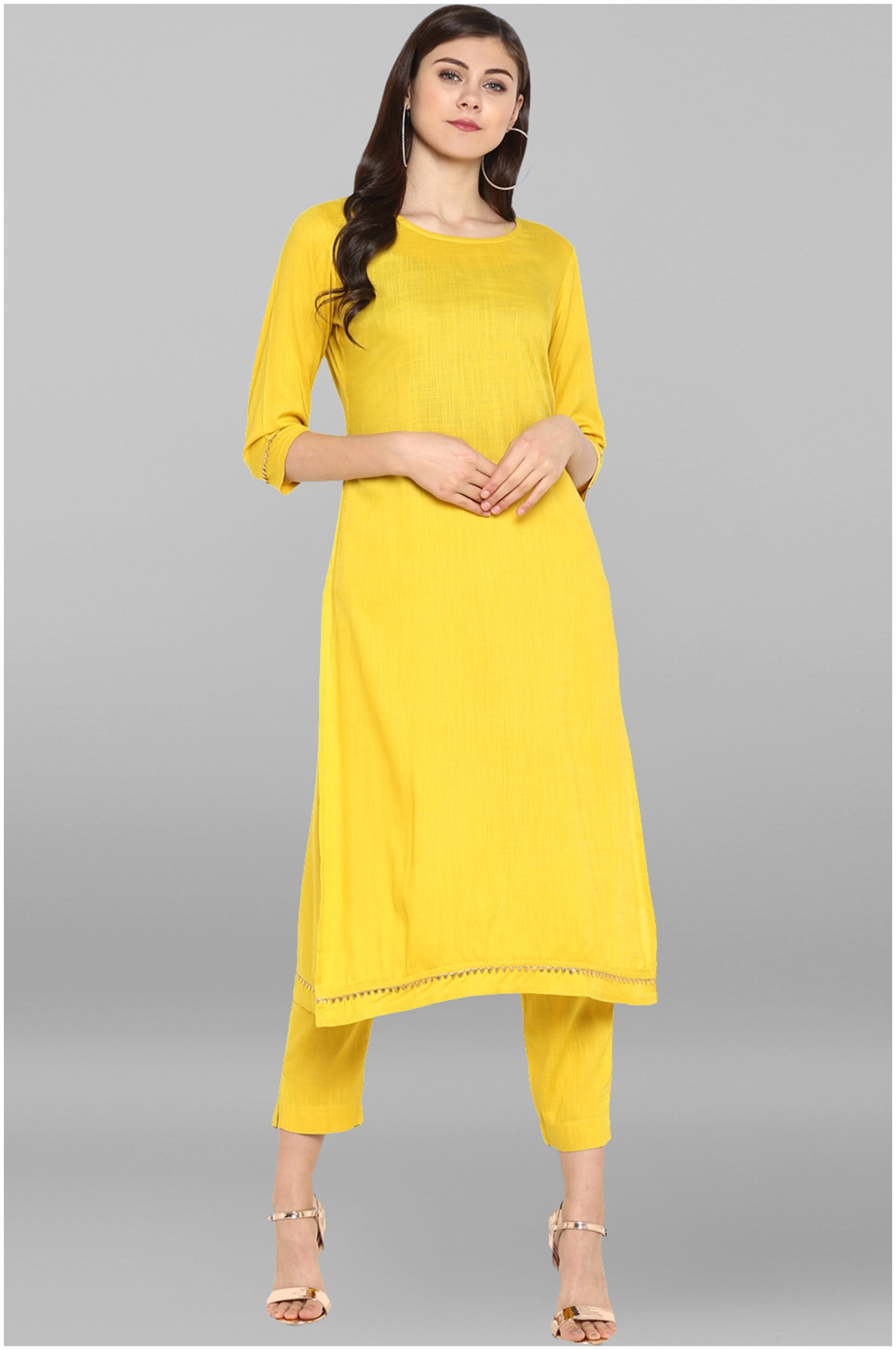 

Janasya Women Yellow Solid Straight Kurta With Pants