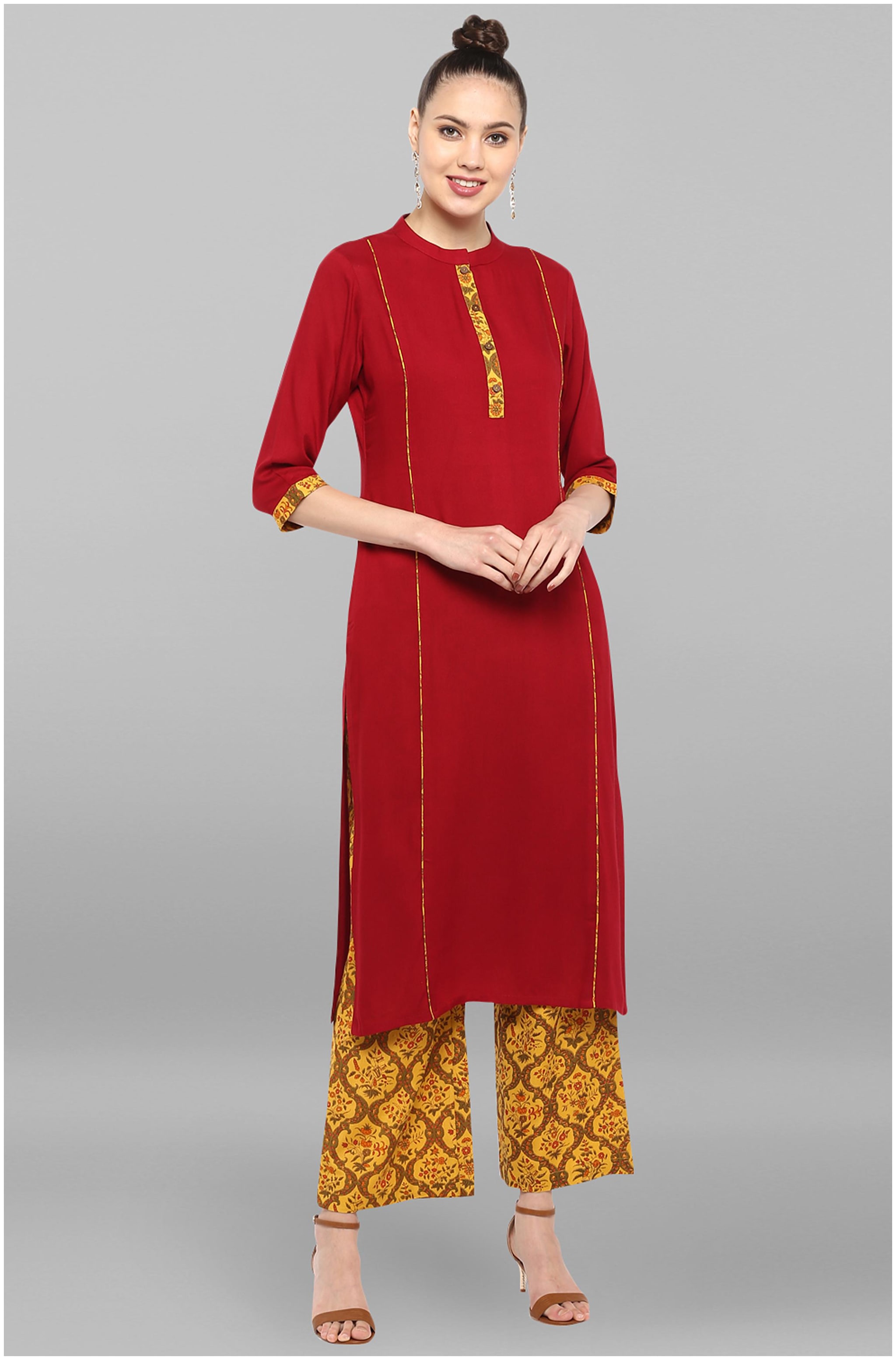 

Janasya Women Maroon Solid Straight Kurta With Palazzo
