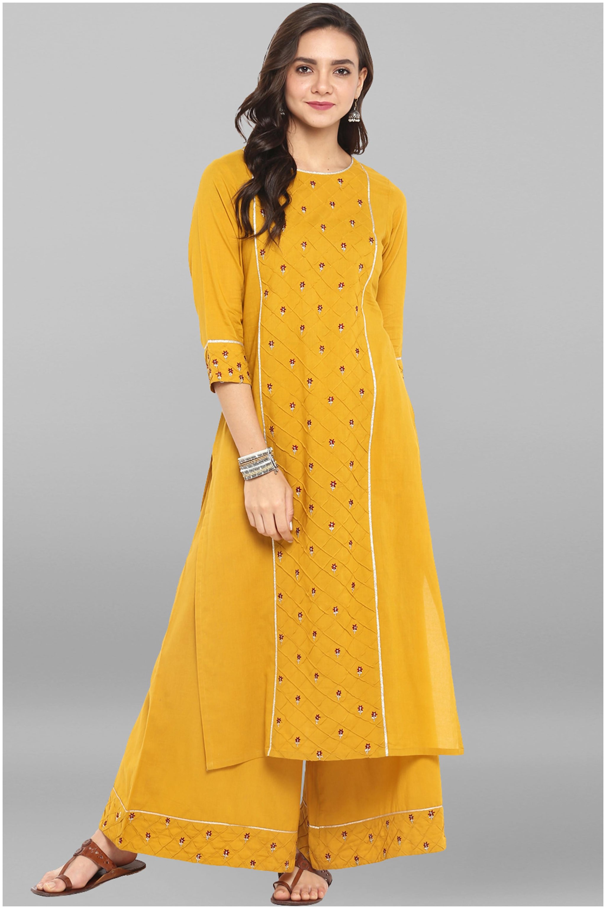 

Janasya Women Yellow Cotton Kurta With Palazzo