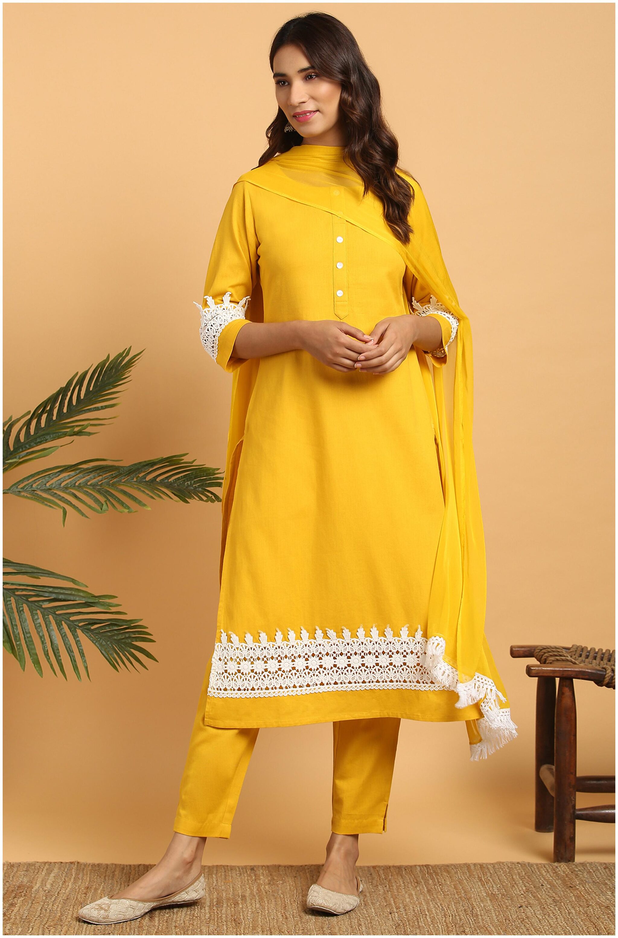 

Janasya Women Mustard Solid Straight Kurta With Pants And Dupatta