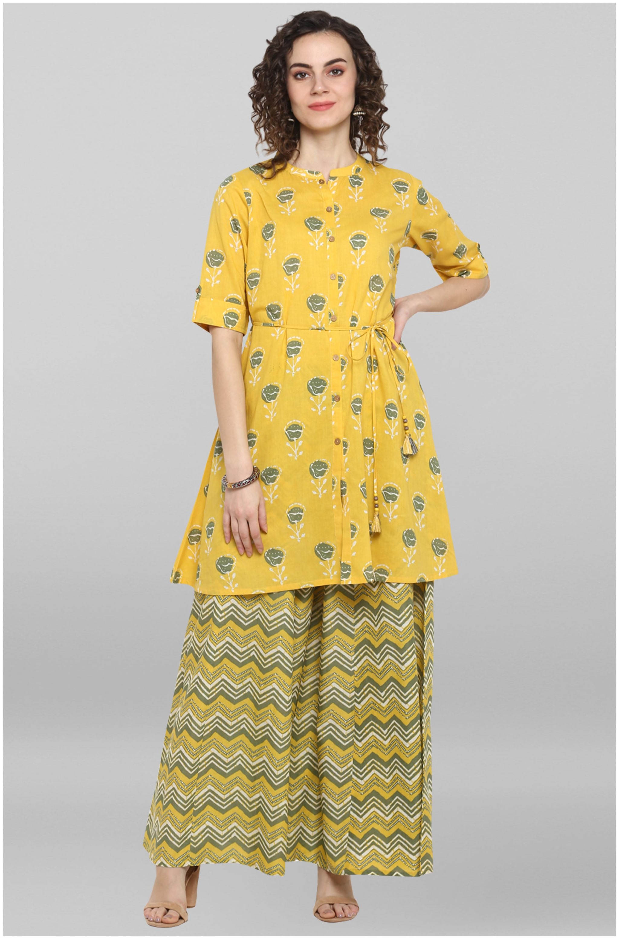 

Janasya Women Yellow Pure Cotton Kurti With Palazzo