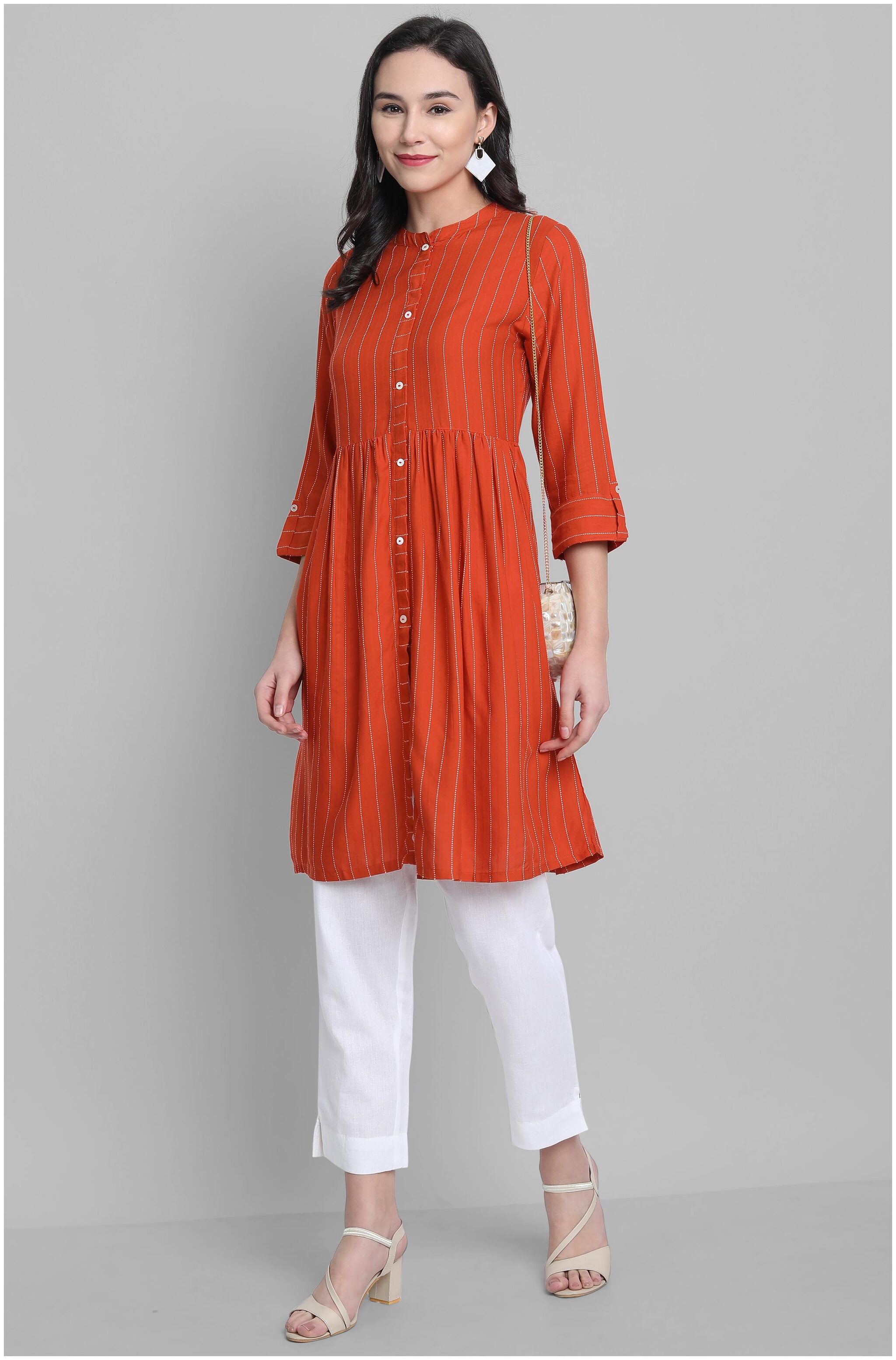 

Janasya Women Orange Striped Fit and Flare Kurta
