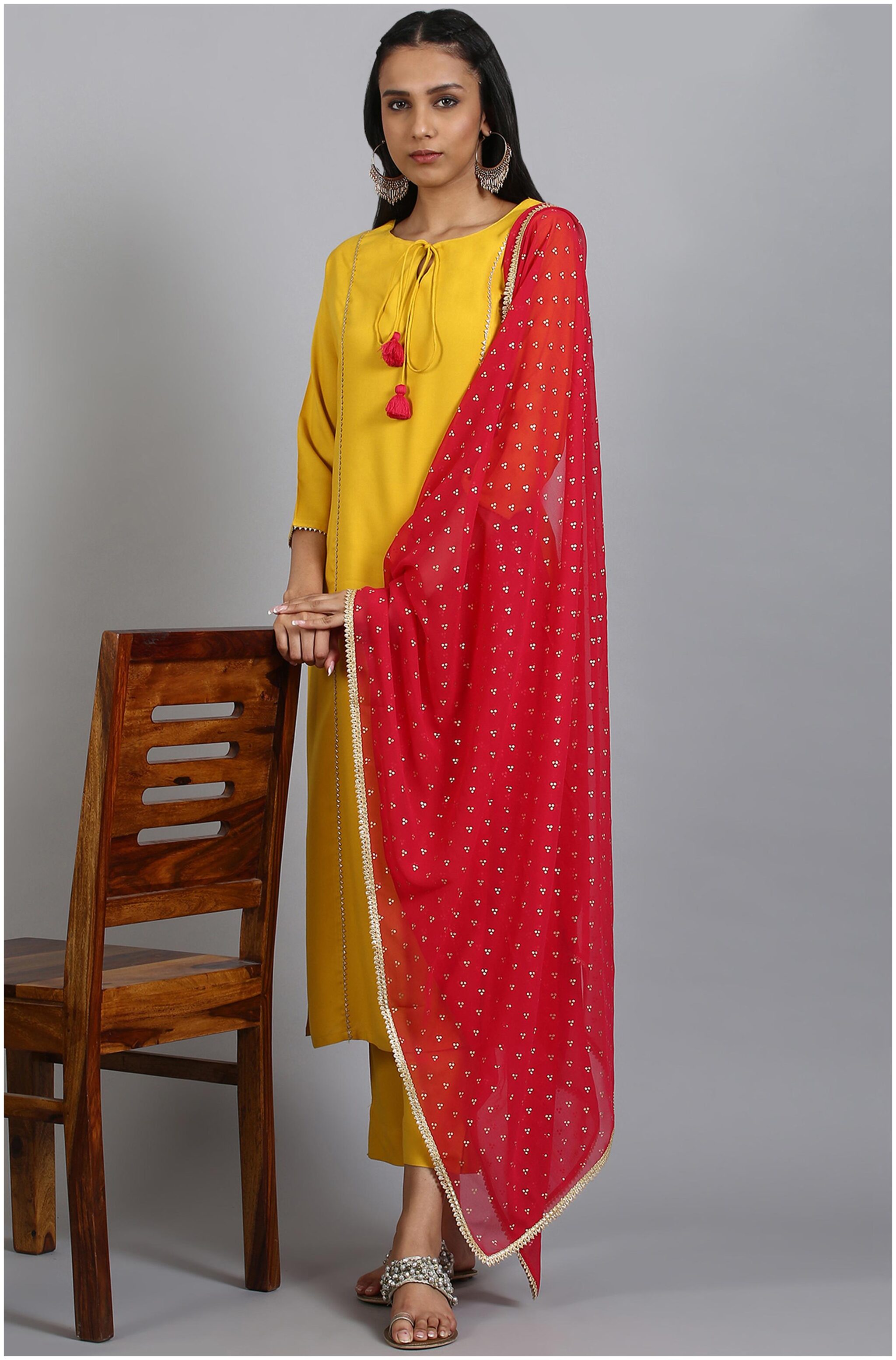 

Janasya Women Mustard Solid Straight Kurta With Pants And Dupatta