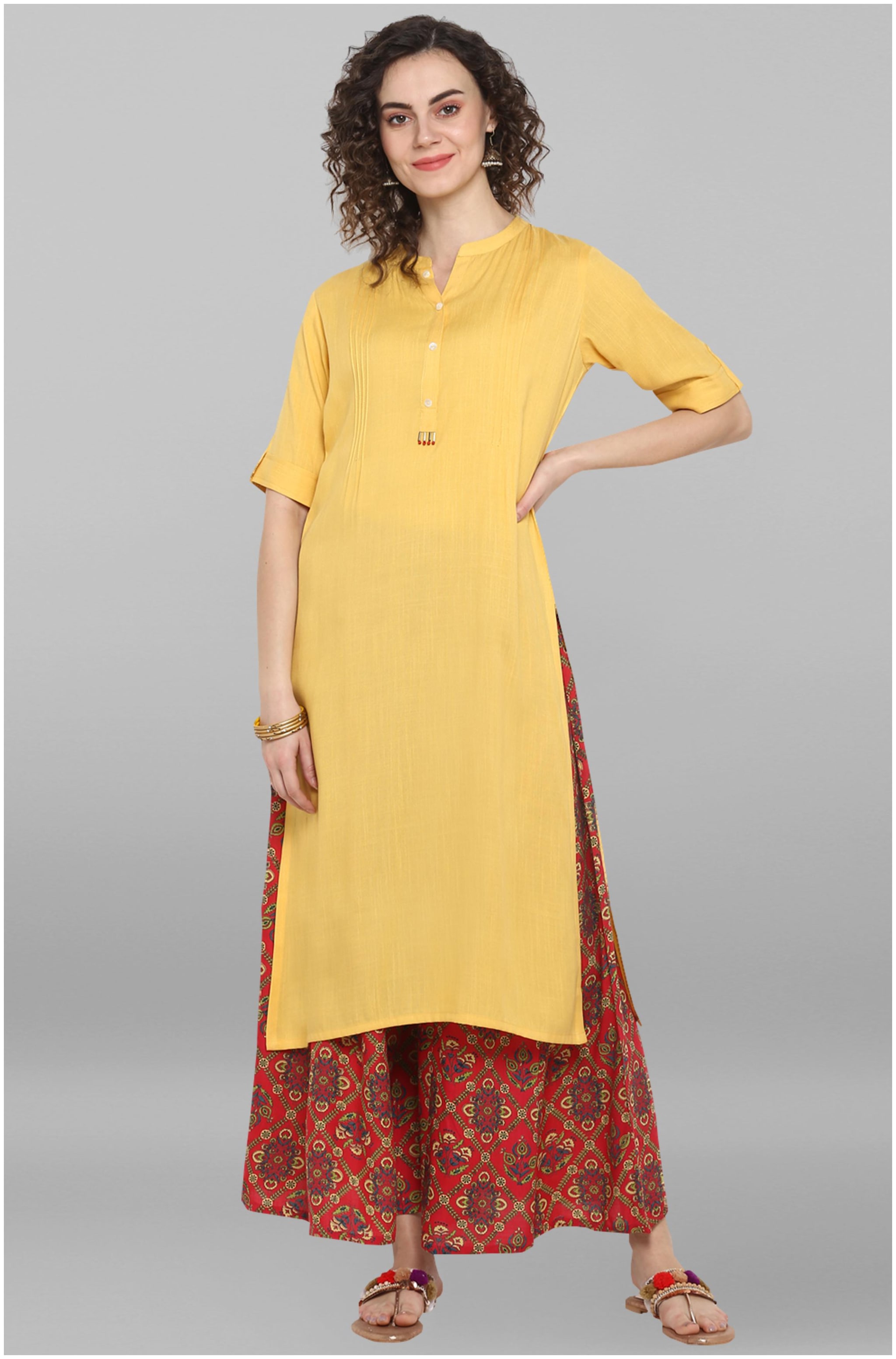 

Janasya Women Yellow Rayon Kurta With Palazzo