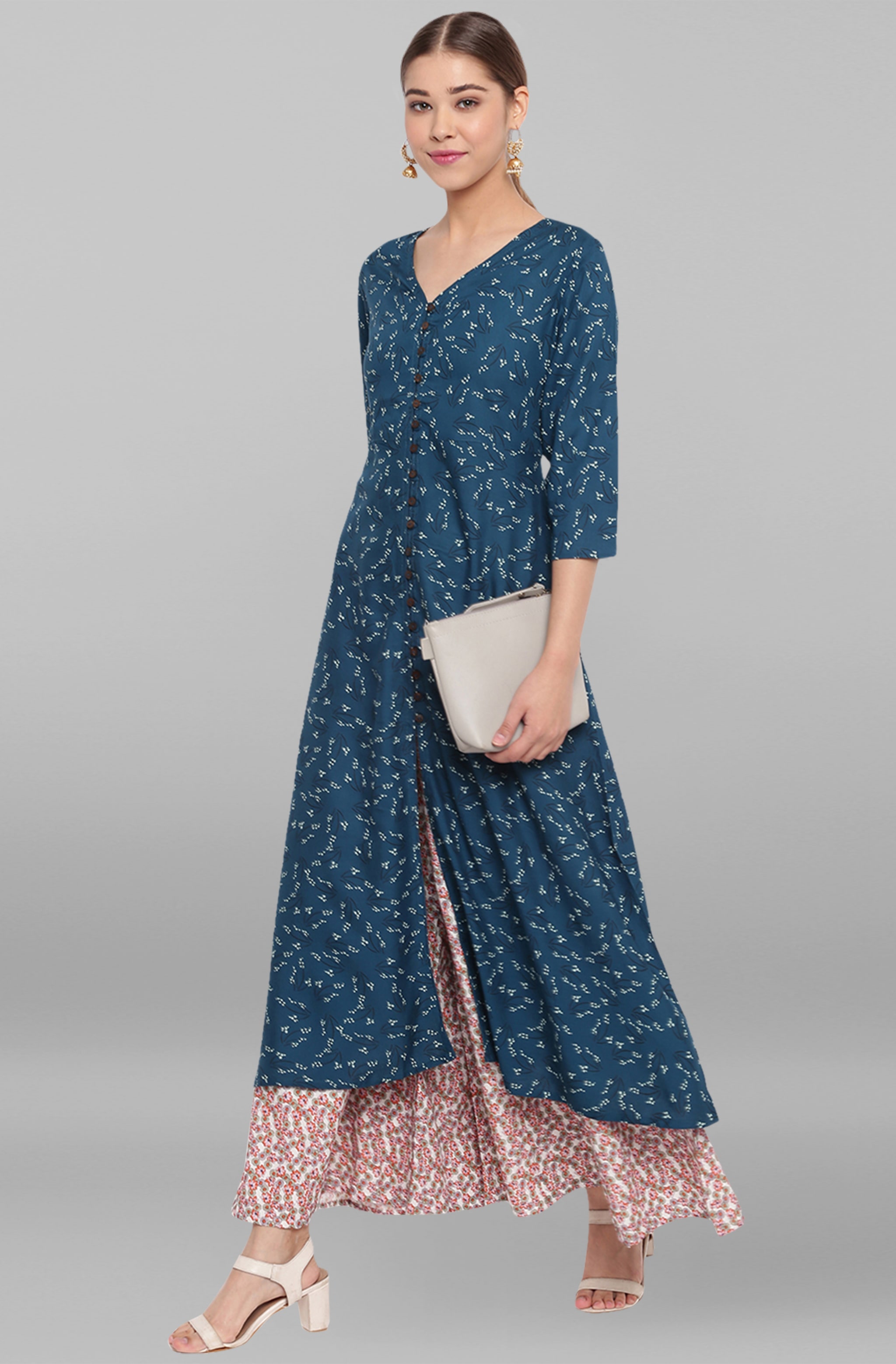 

Janasya Women Viscose Rayon Printed Blue Kurta With Palazzo