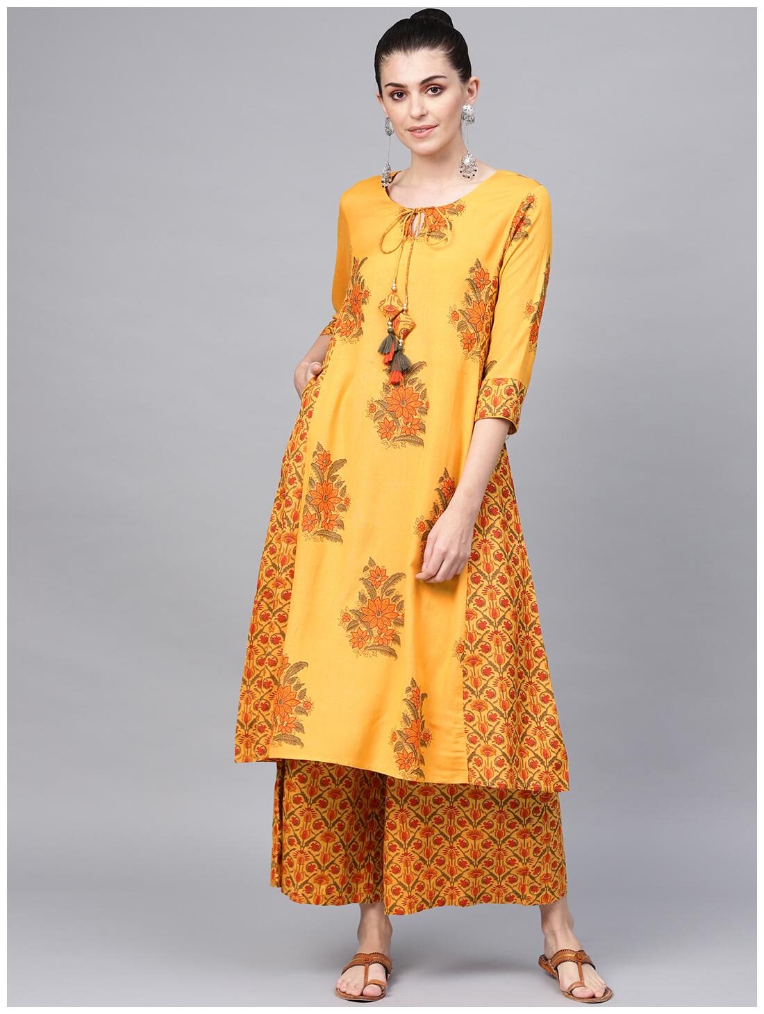 

Juniper Mustard Rayon Printed A-Line Kurta Palazzo Set