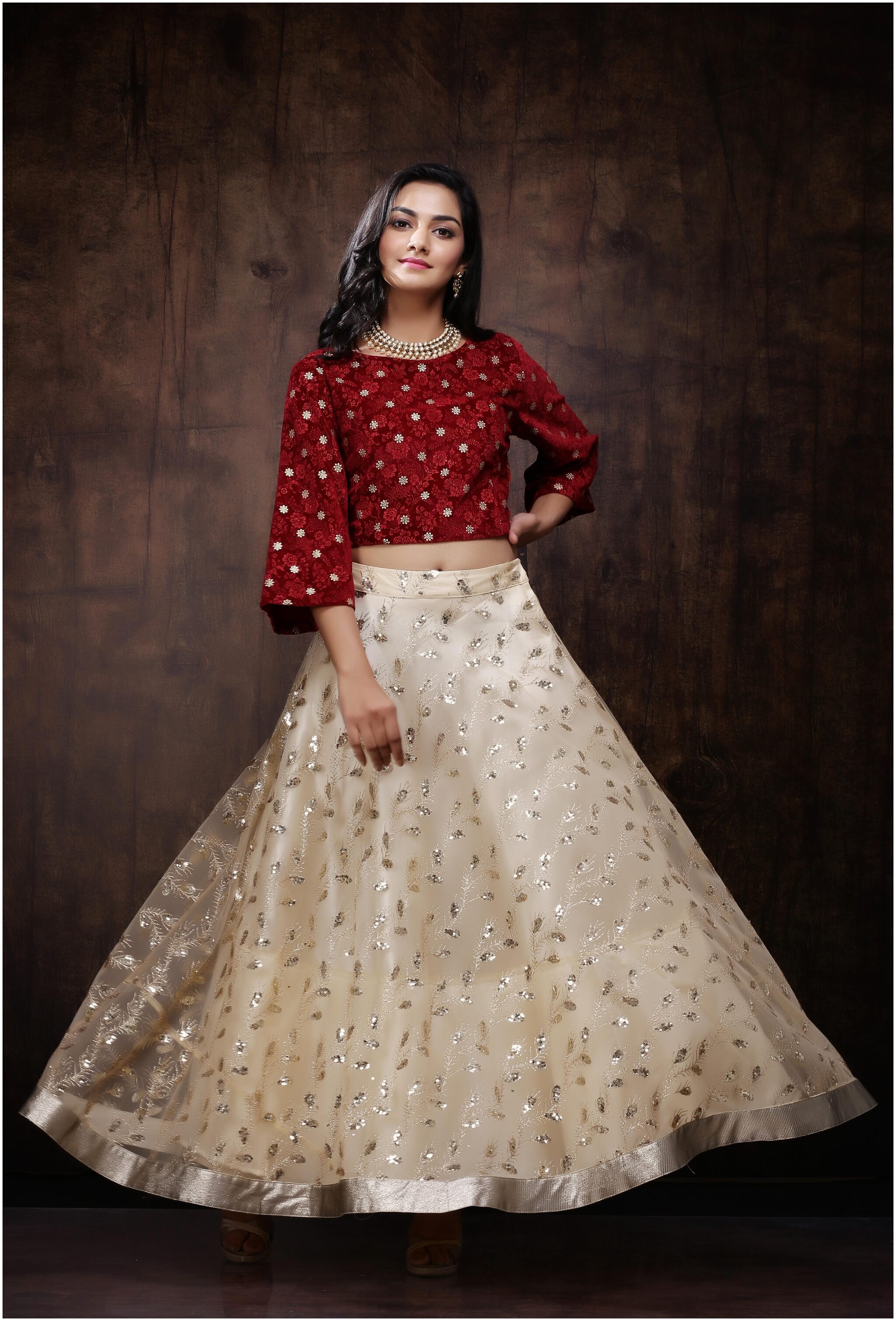 

Juniper Net Embellished Golden Maroon Color Crop Top Lehenga