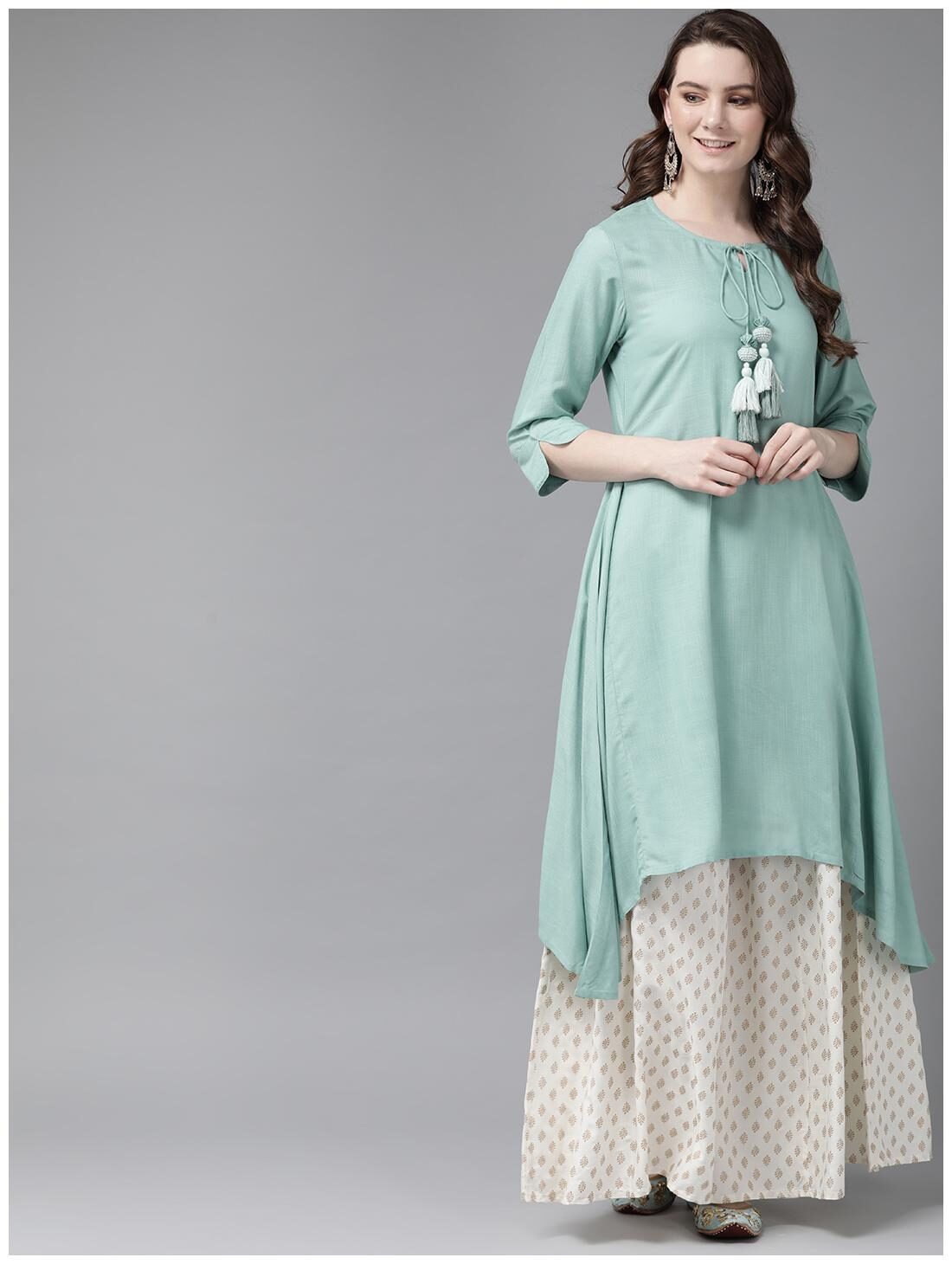

Juniper Women Turquoise Solid Assymetrical Kurta