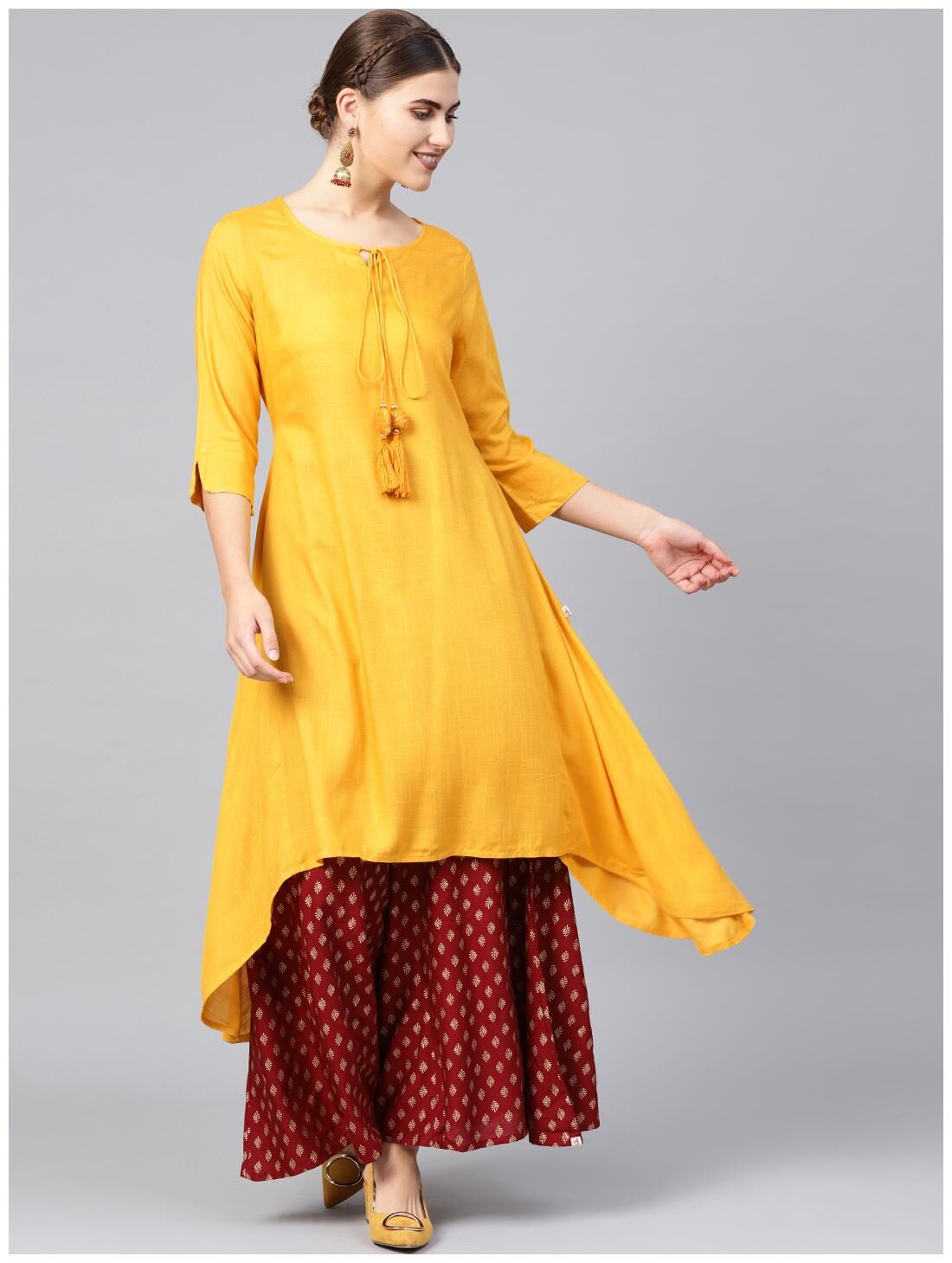 

Juniper Women Mustard Solid Assymetrical Kurta