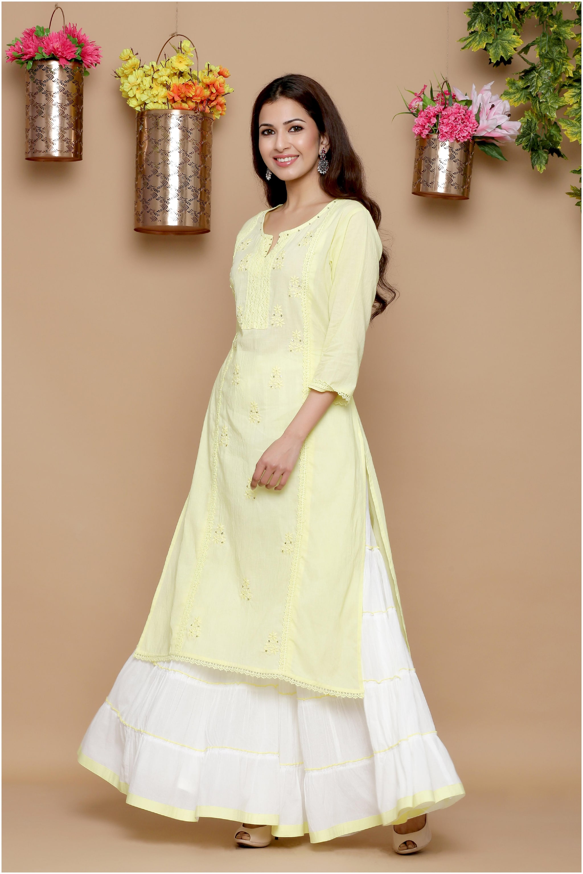 

Juniper Women Cambric Kurta With Sharara (Yellow)