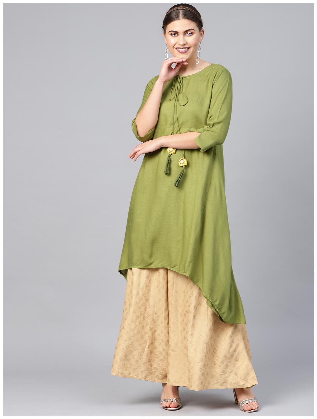 

Juniper Women Green Solid Assymetrical Kurta